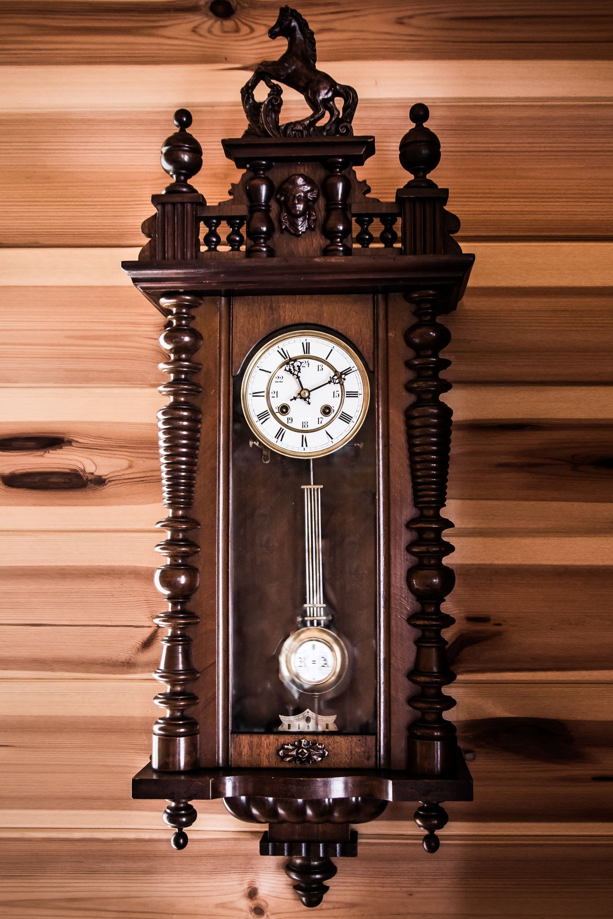 brown pendulum clock free image