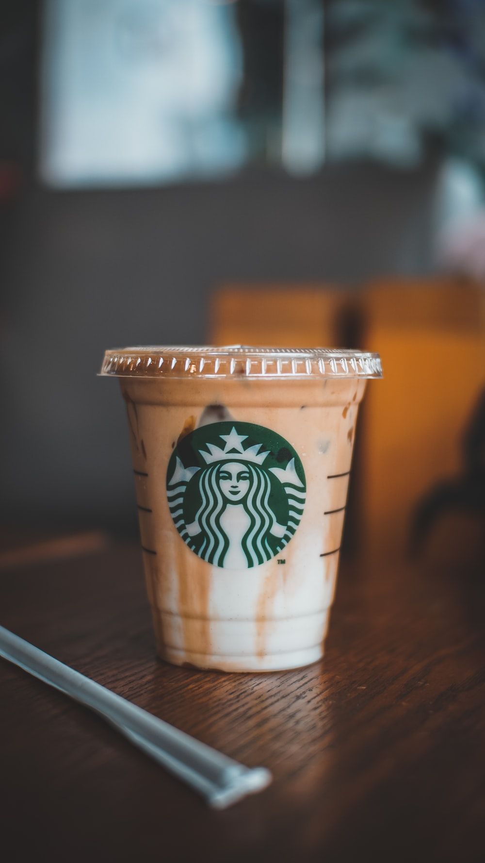 white and brown starbucks cup photo