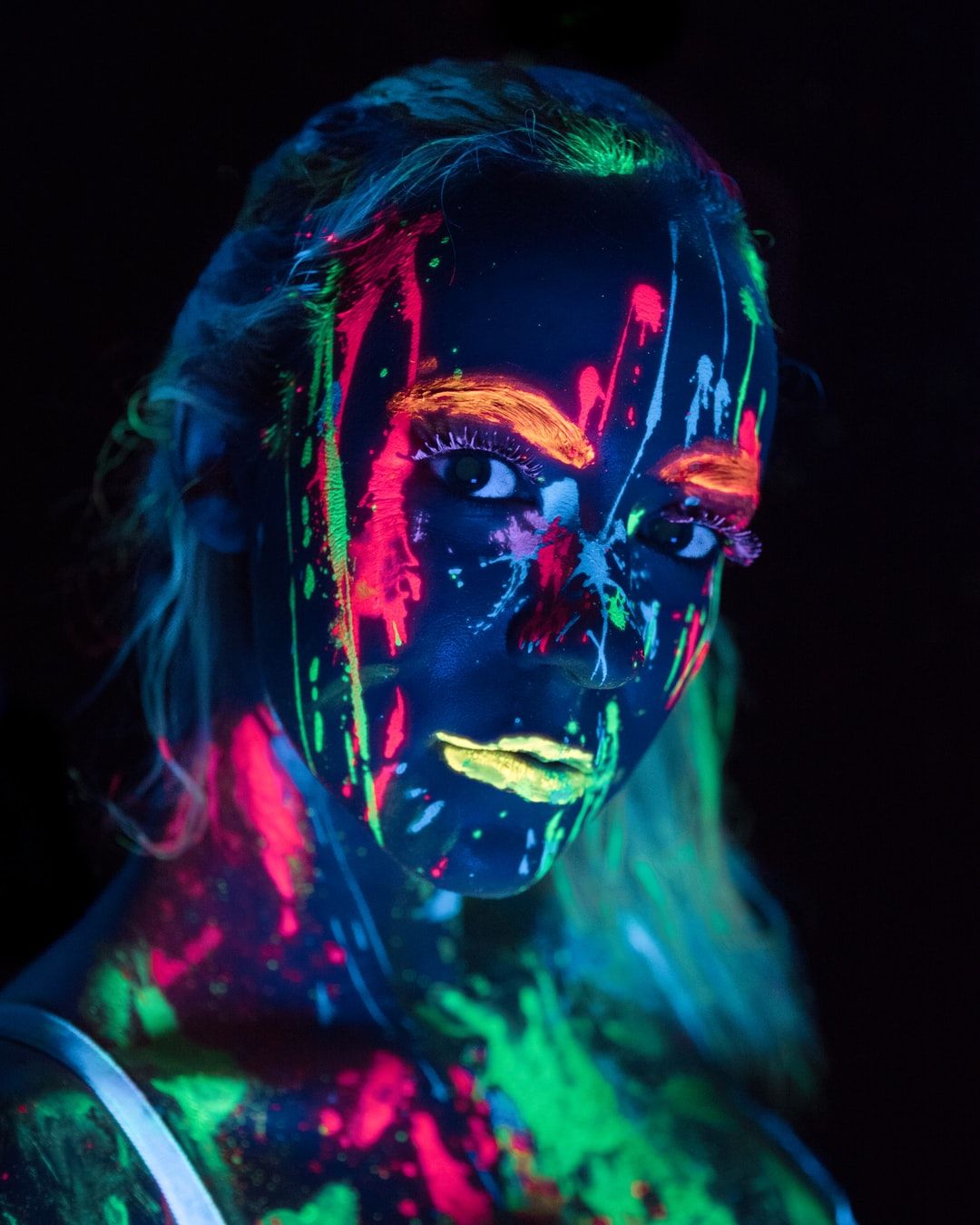 woman with glow in the dark body paint photo