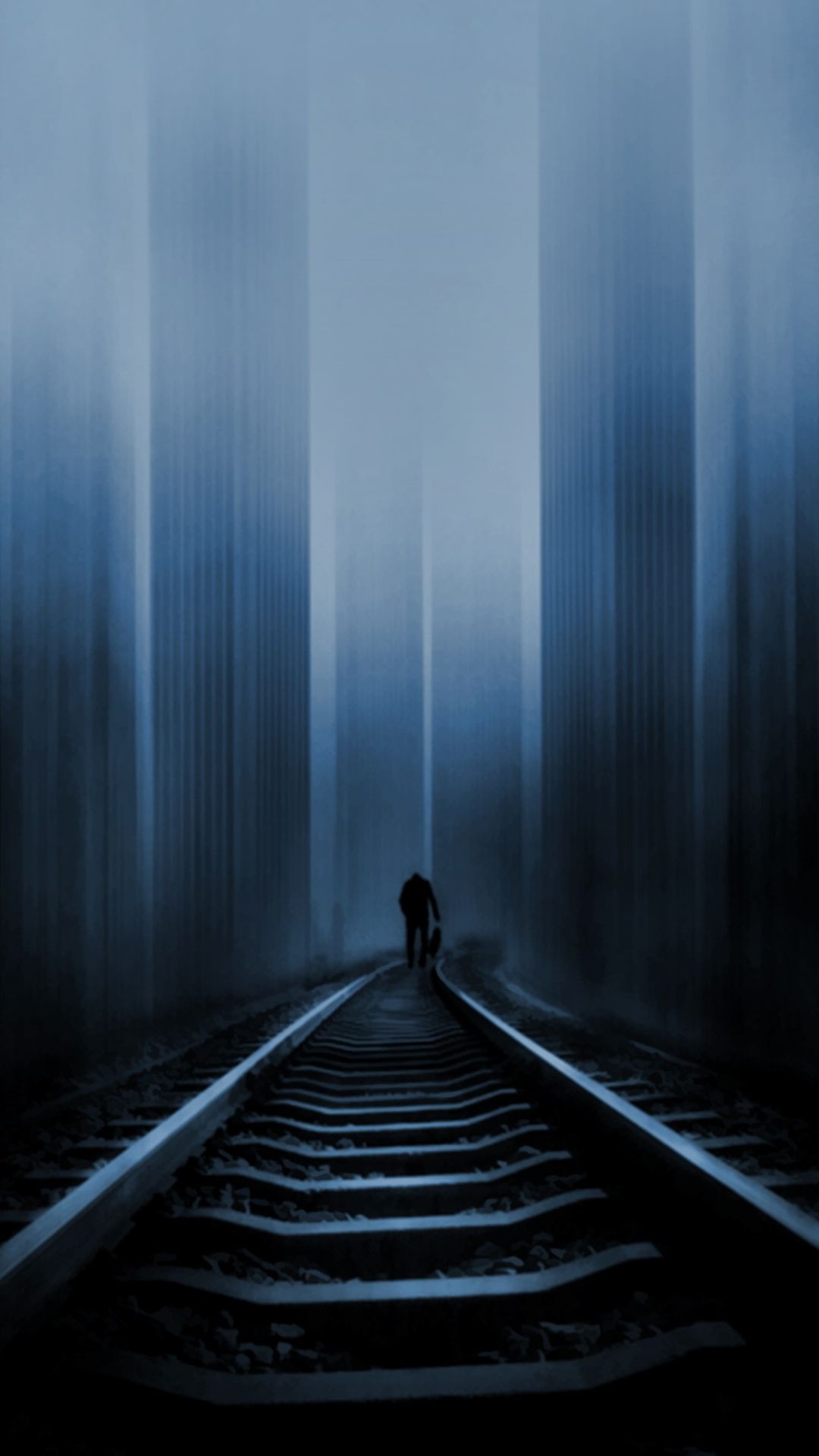 Man walking on a dark track