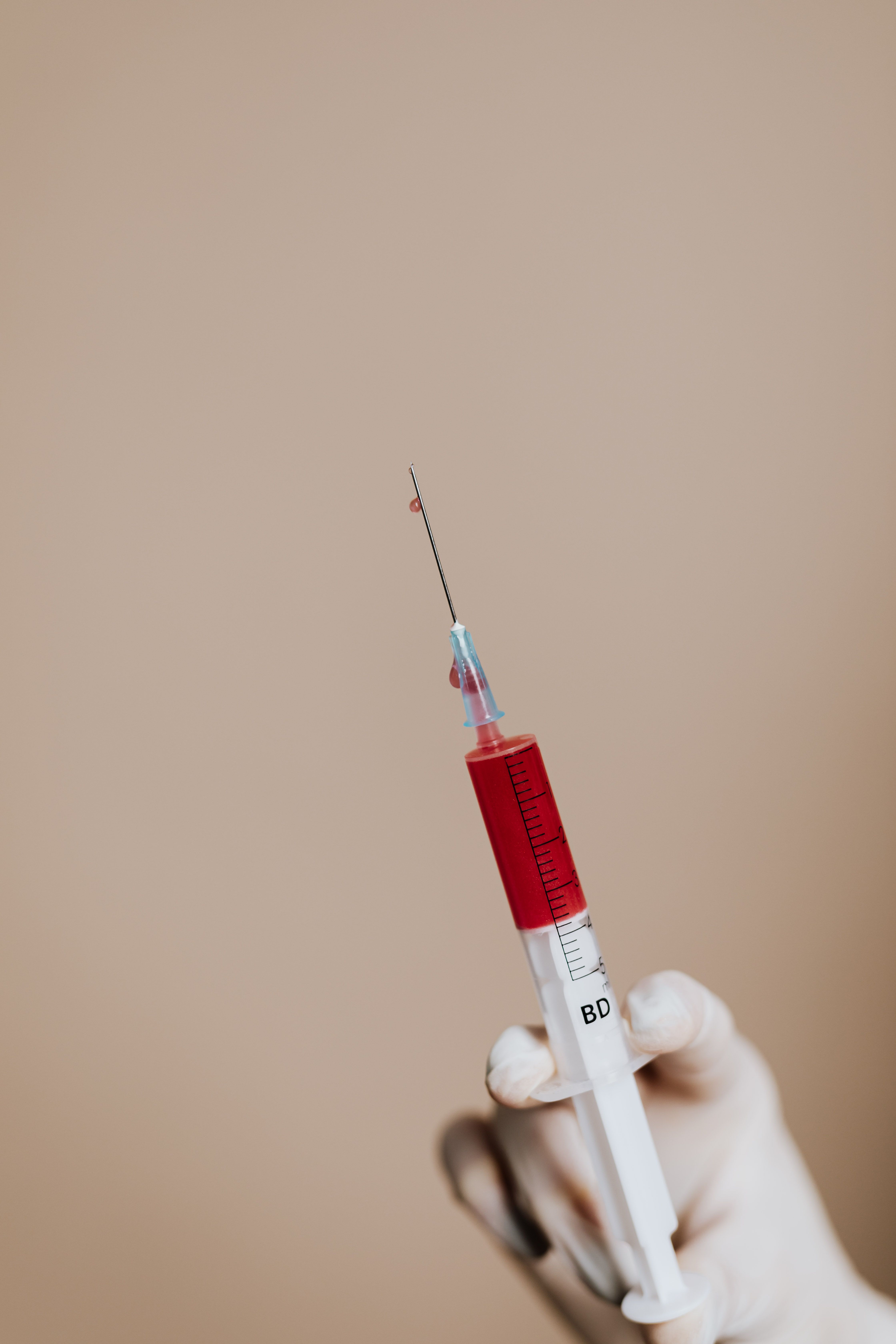 Close Up Photo Of Syringe · Free