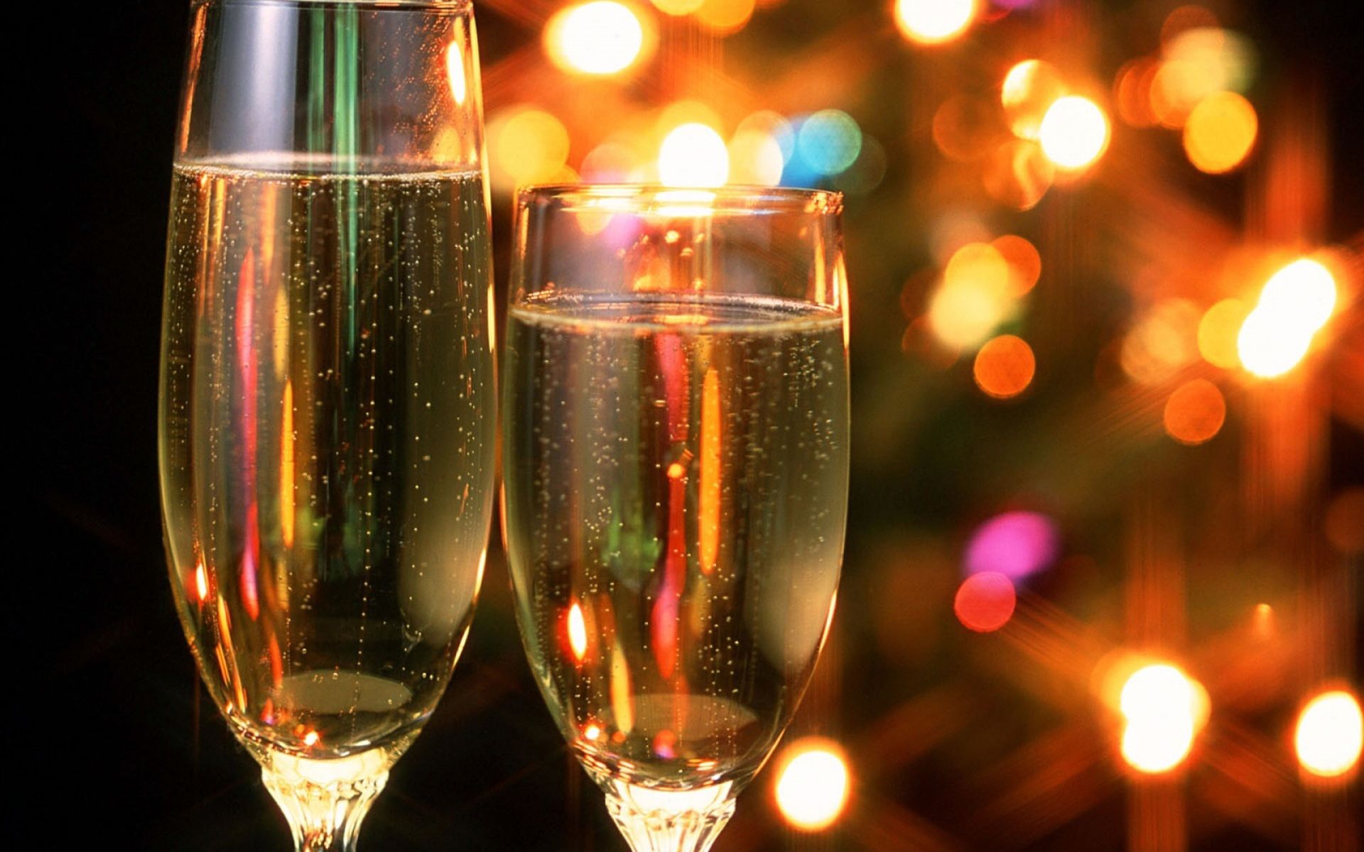 Raising glasses of champagne at New Year Desktop wallpaper 1920x1200