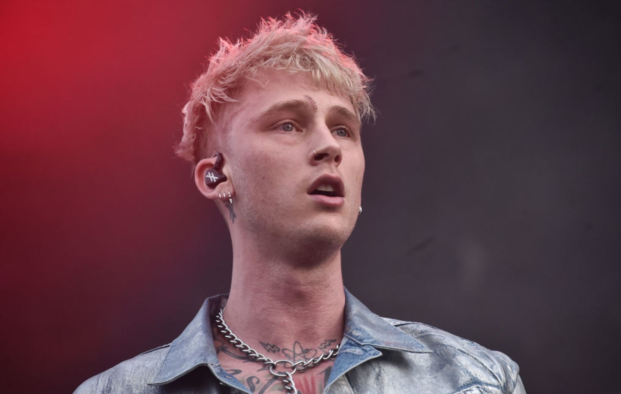 Machine Gun Kelly shares 'Tickets To My Downfall' cover shoot video
