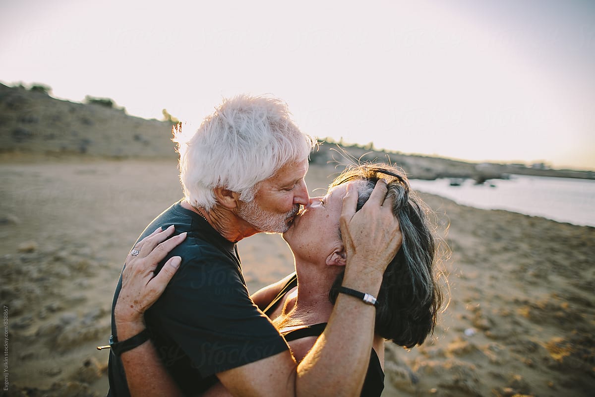 Old couple kissing by Evgenij Yulkin, Senior