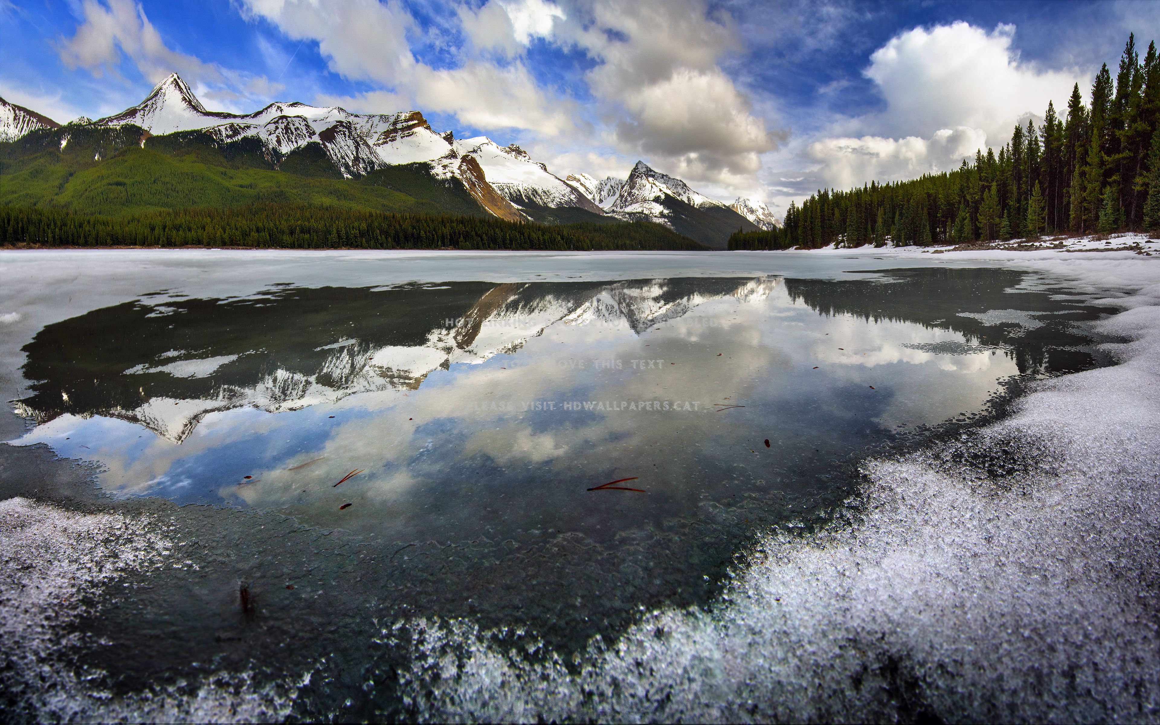 frozen water alberta mountains nature lake