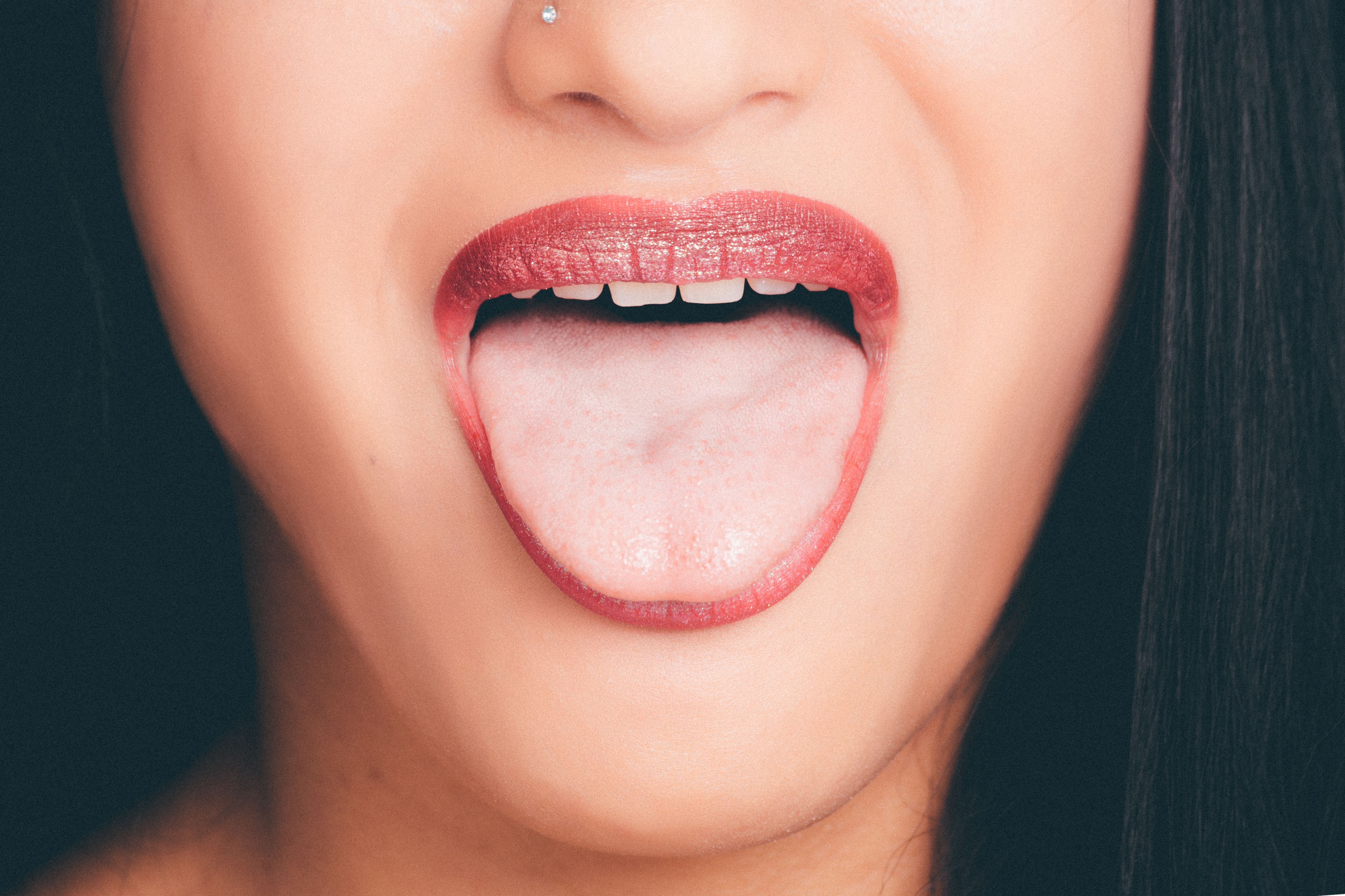 Woman With Wide Open Mouth and Tongue Out · Free