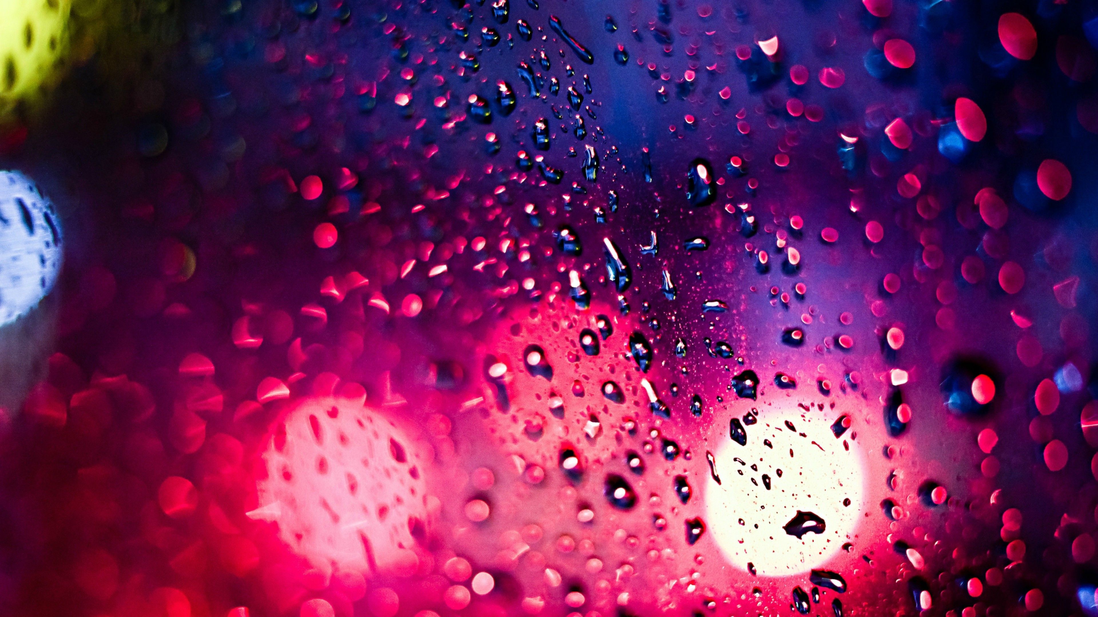 Cool Water Droplets On Orange Glass 4K Phone Wallpaper