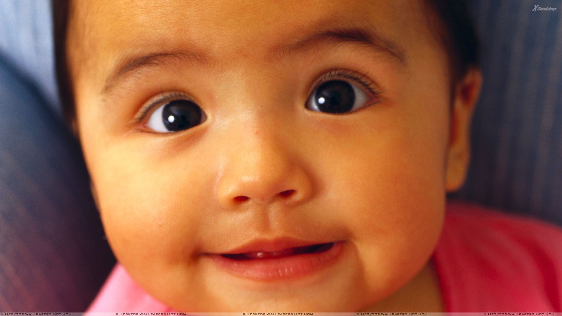 Innocent Baby Face Closeup Wallpaper