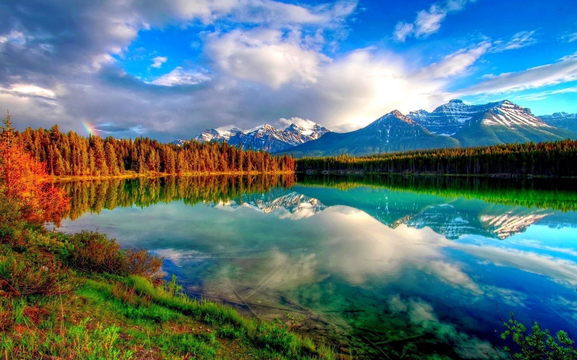 Gorgeous photo of a lake in front of the mountains #nature #earth #mountains #lake #vibrant. Scenery wallpaper, Beautiful scenery wallpaper, Amazing nature photo