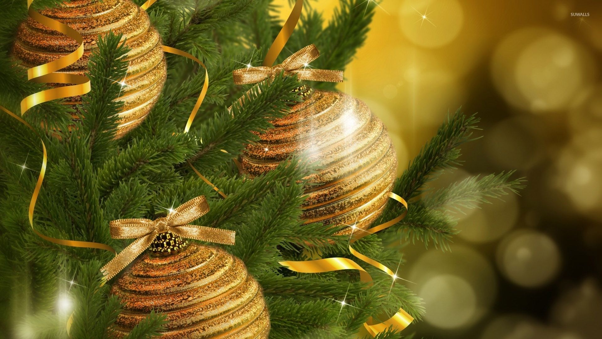 Sparkly golden baubles in the Christmas tree wallpaper wallpaper