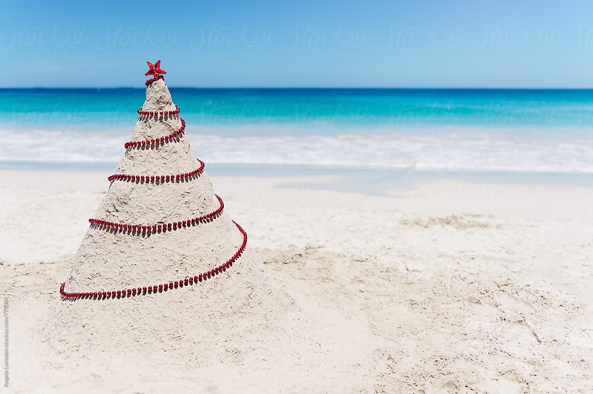 A sand christmas tree at the beach in Western Australia at Christmas