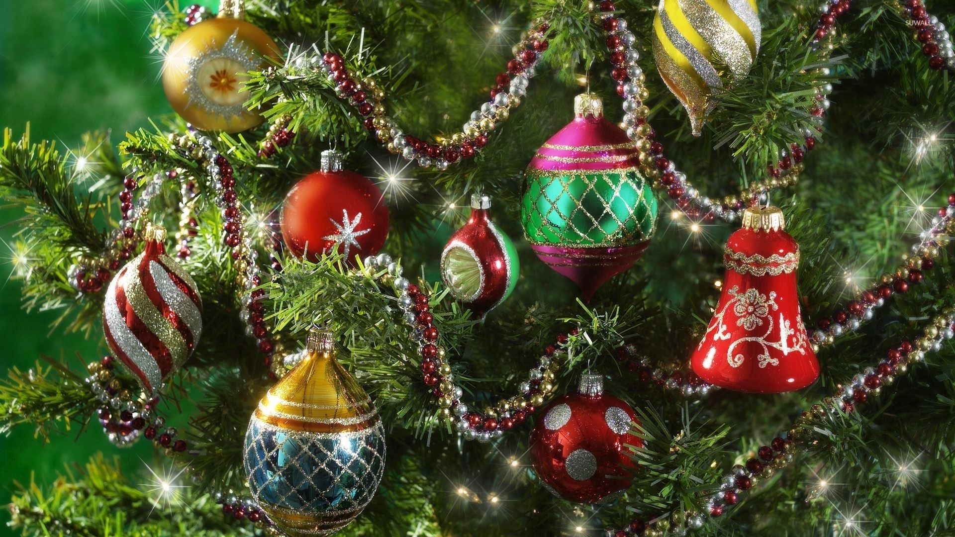 Colorful baubles in the sparkly Christmas tree wallpaper wallpaper