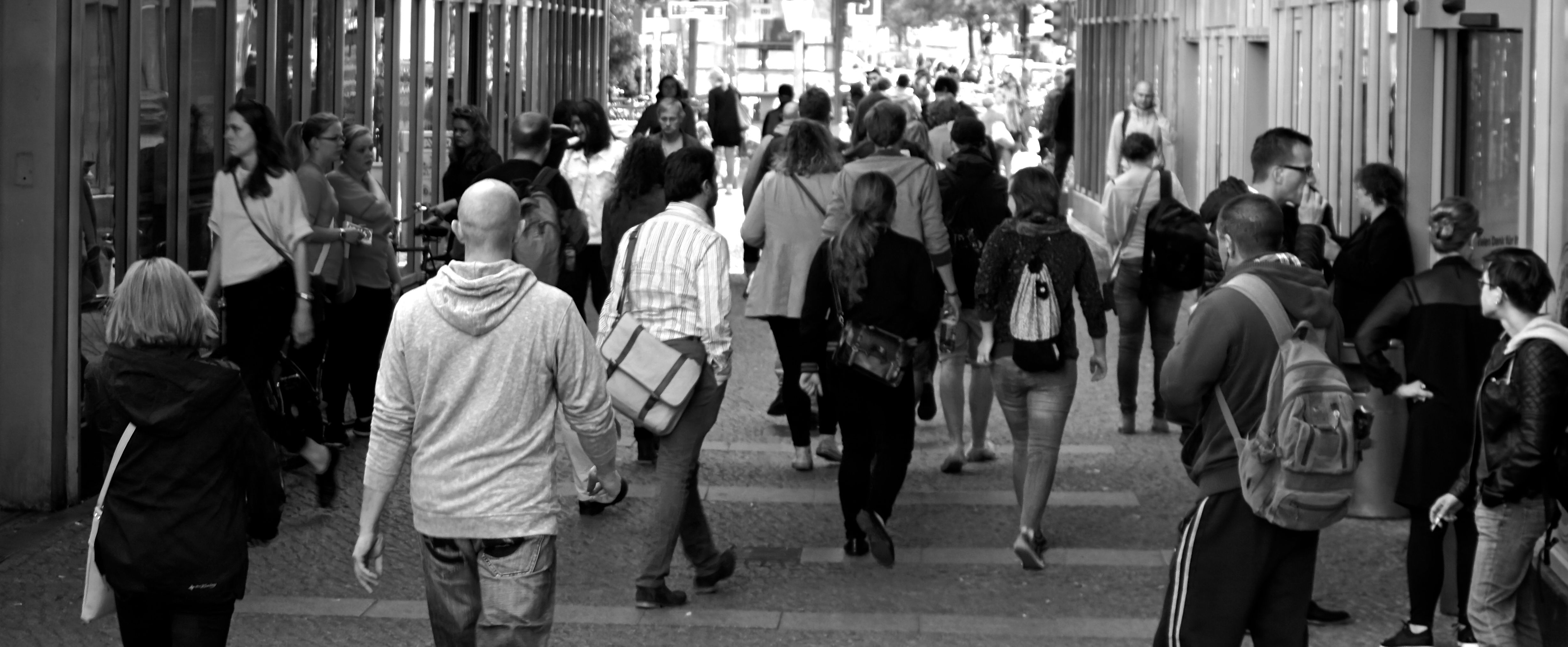 Grayscale Photography of People Walking Near Buildings · Free