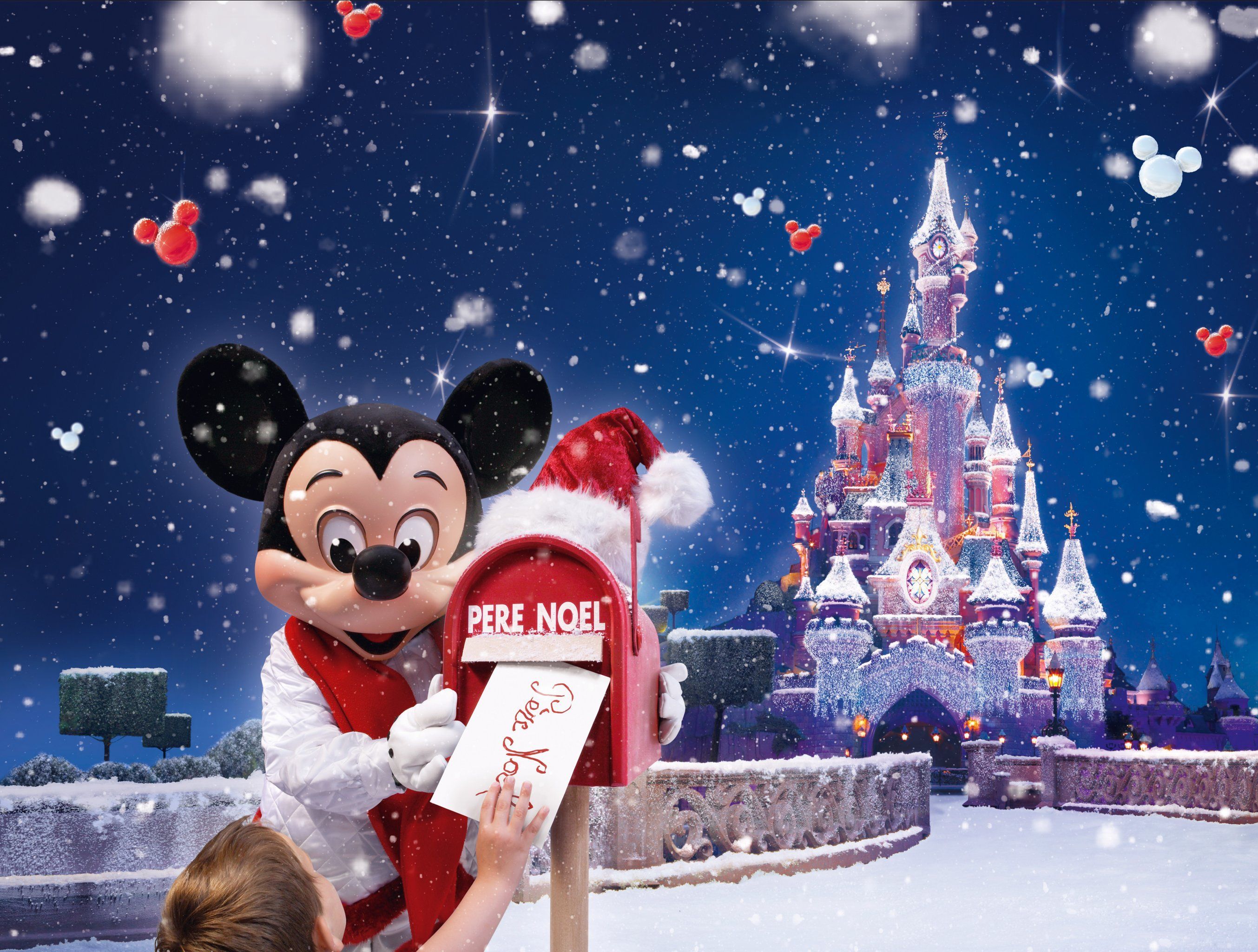 Mickey Mouse in Disneyland on Christmas wallpaper and image, picture, photo