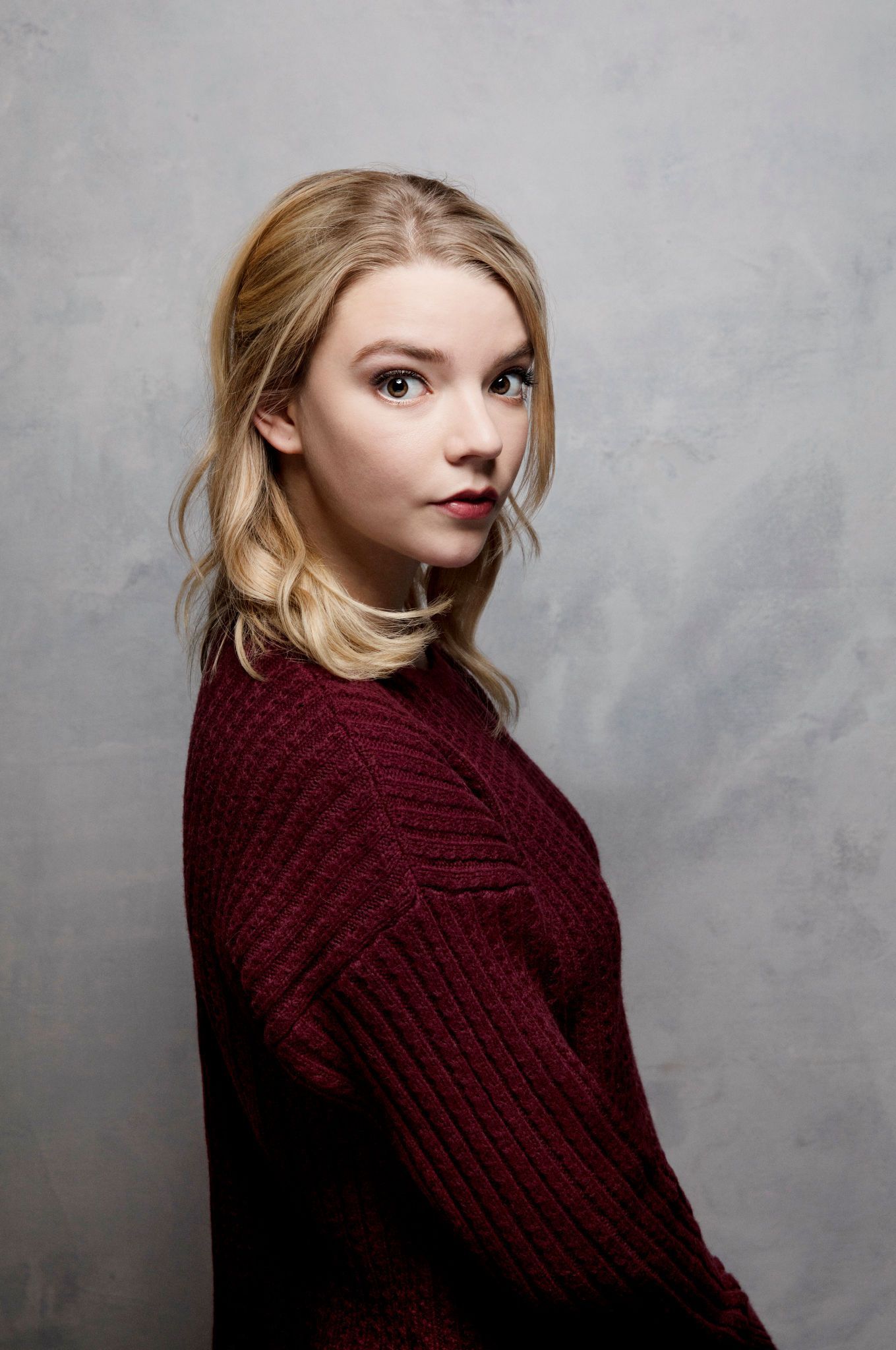 Anya Taylor Joy, #women, #actress, #blonde, #looking At Viewer, #sweater, #simple Background, #portrait. Wall. Anya Taylor Joy, Anya Taylor Joy Split, Anya Joy