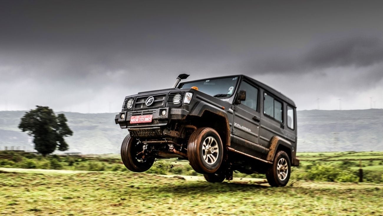 Force Gurkha 4x4 Car in Mud · Free Stock Photo