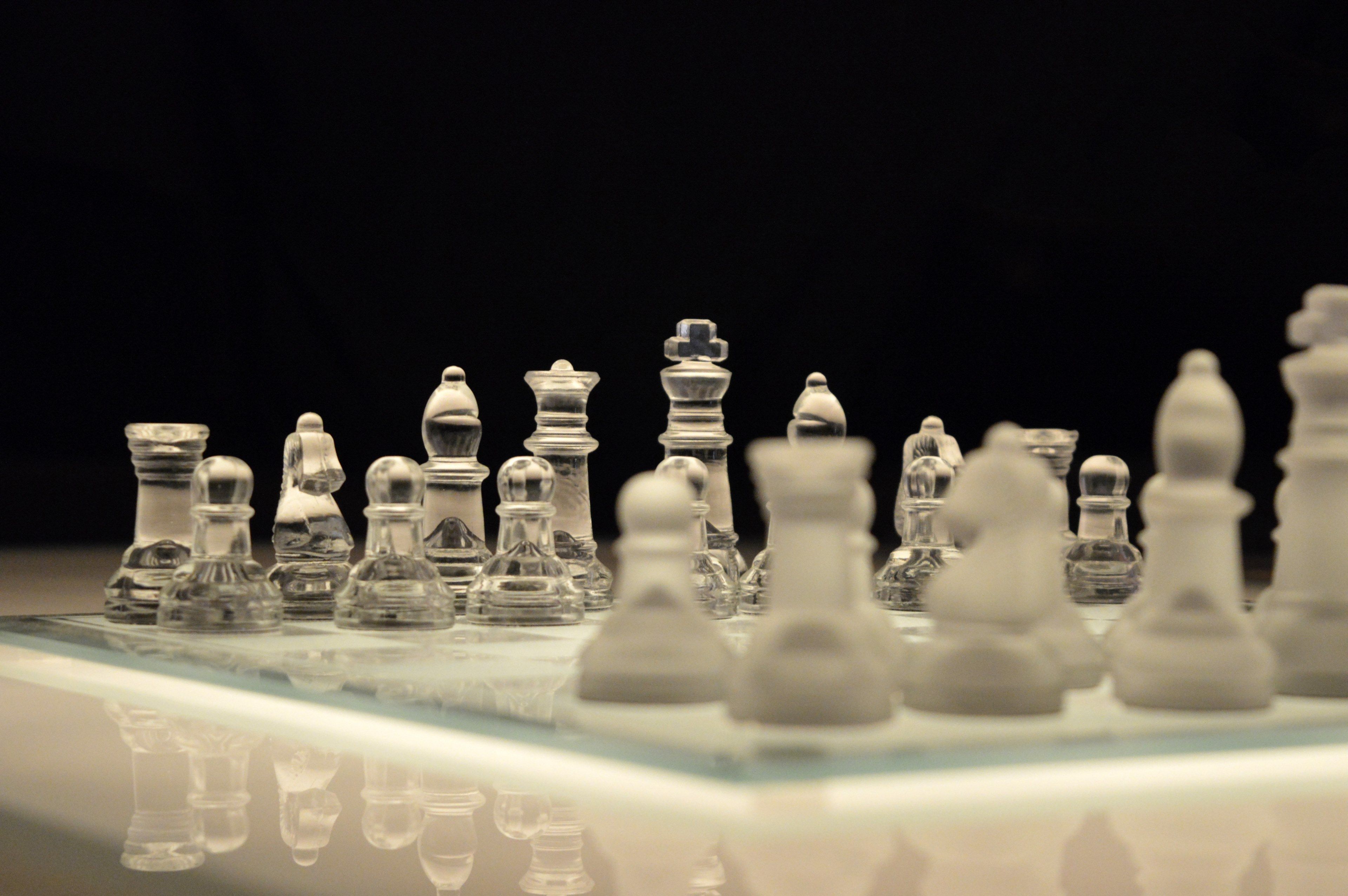 Wallpaper / chess game chessboard glass board planning 4k wallpaper