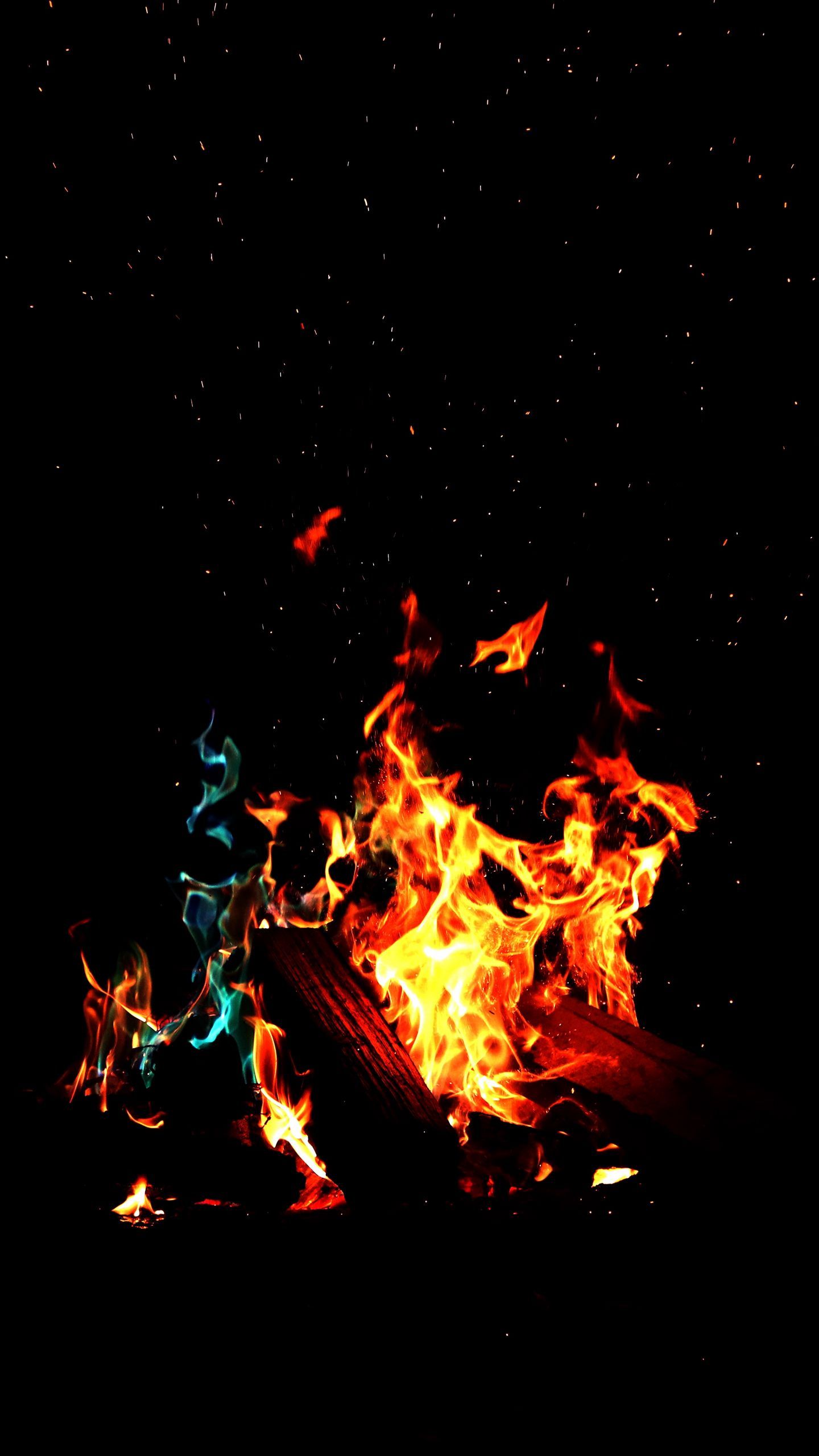 Download wallpaper 1440x2560 fire, flame, dark qhd samsung galaxy s s edge, note, lg g4 HD background