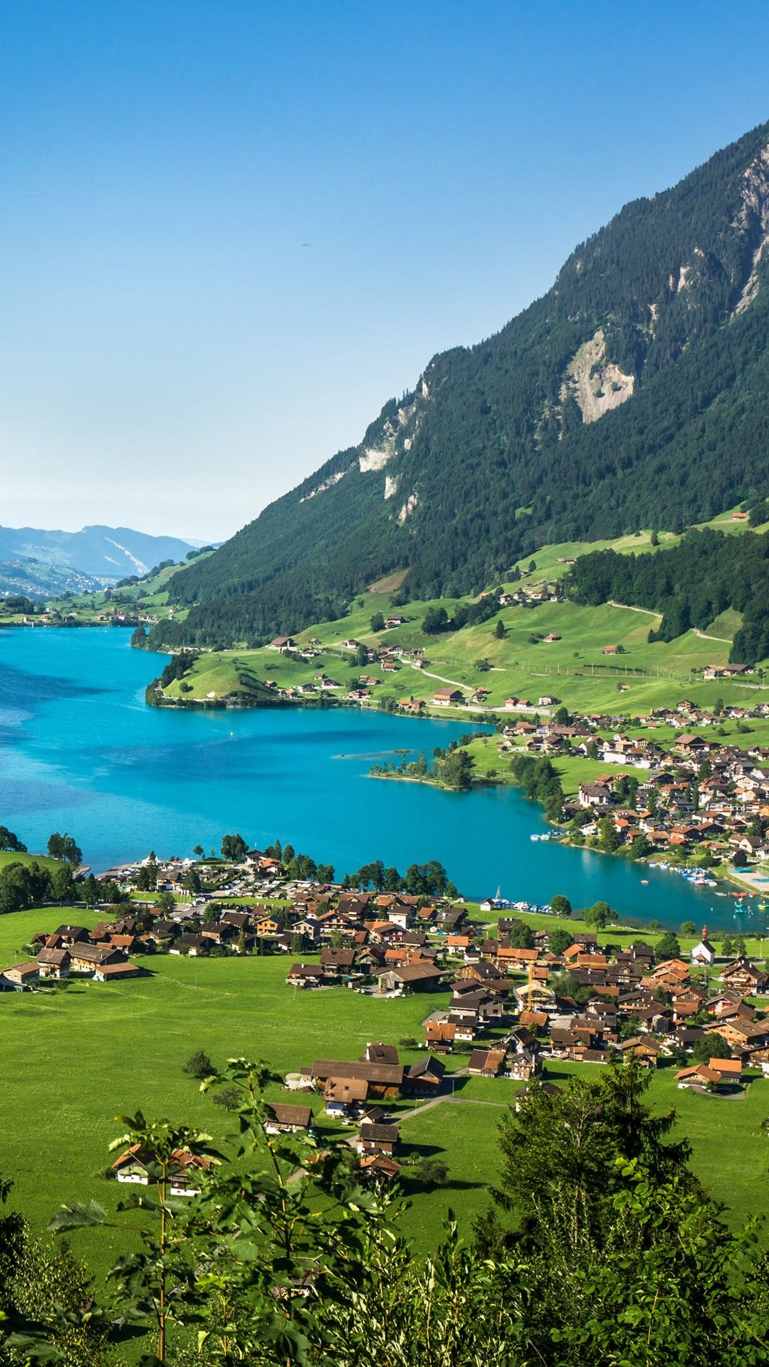 Town and Lake Lungern (Lungerersee) view from Bruenigpass, Obwalden, Switzerland. Windows 10 Spotlight Image