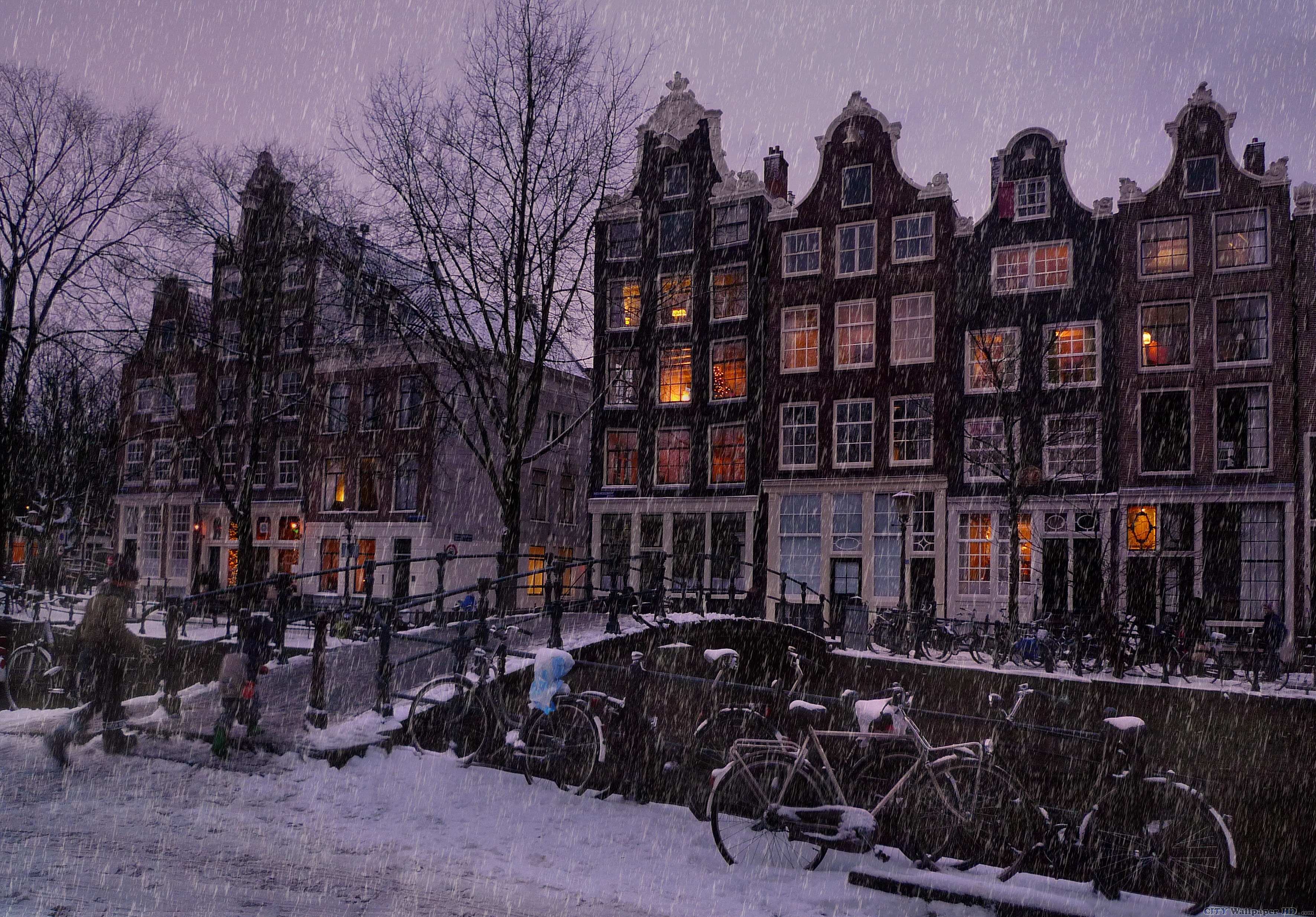 Winter evening in Amsterdam. Wallpaper cities for android. Amsterdam, Netherlands, capital of the bridge