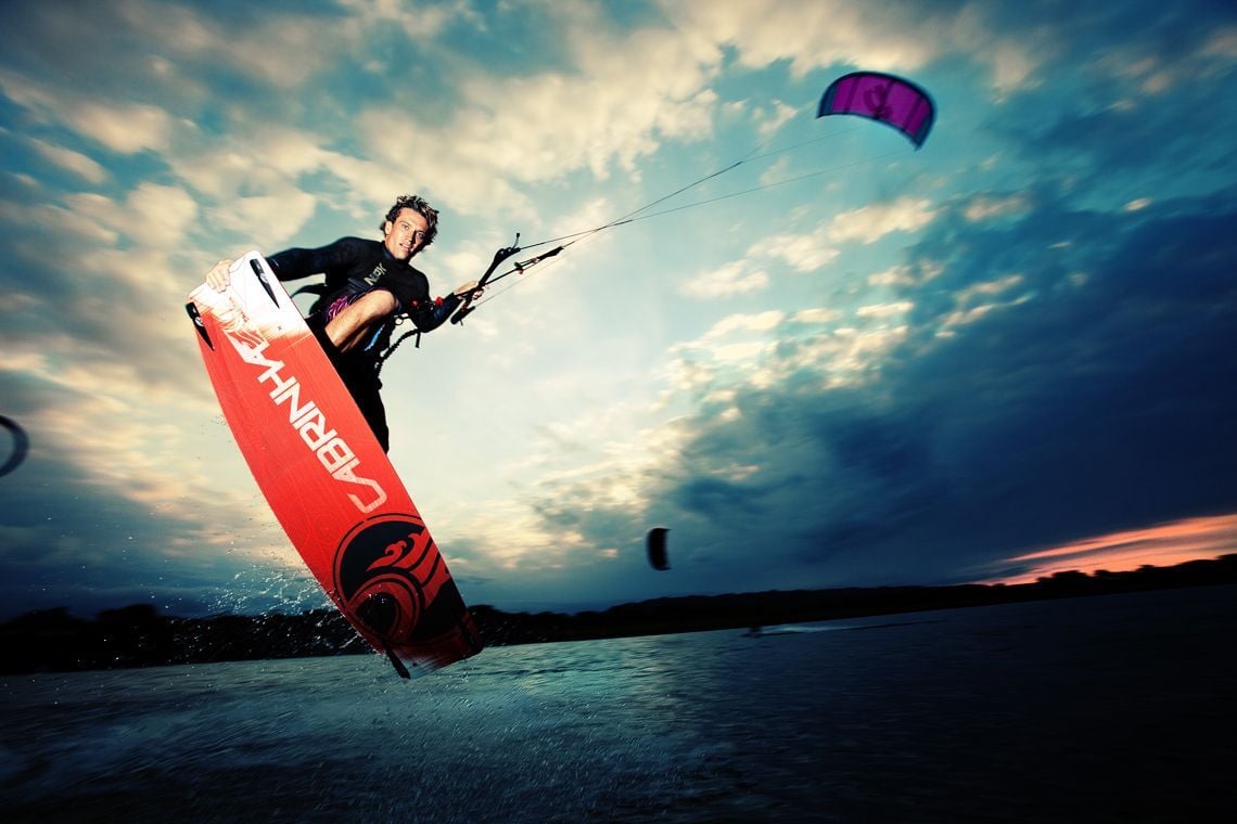 Kitesurfing wallpaper: Damien LeRoy with a tailgrab at dusk. Kite surfing, Kiteboarding, Surfing