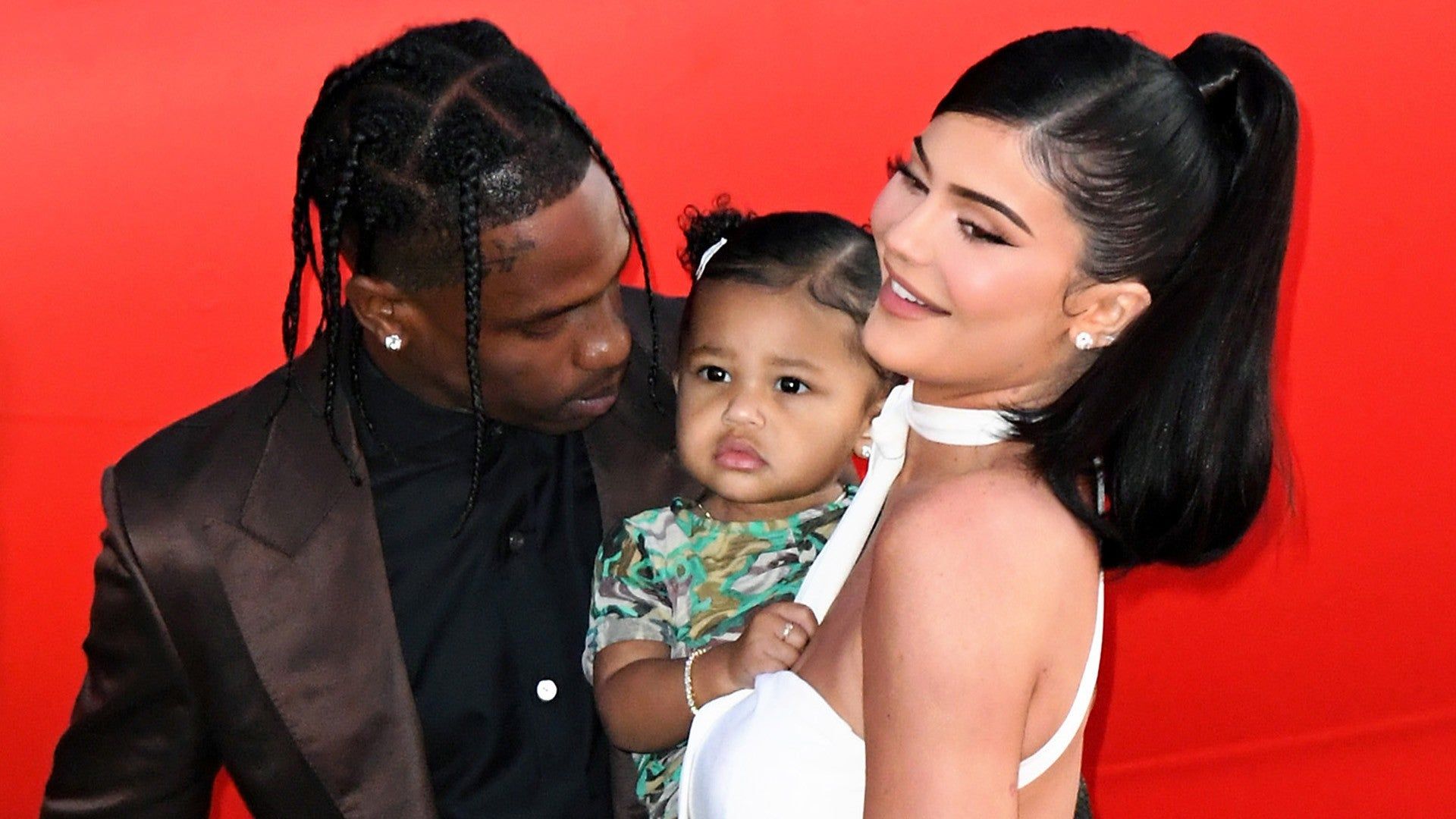 Travis Scott & Kylie Jenner Pack on the PDA While Posing for Family Pics With Stormi at Netflix Premiere