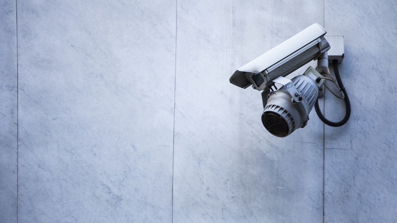 Surveillance Camera On A Wall