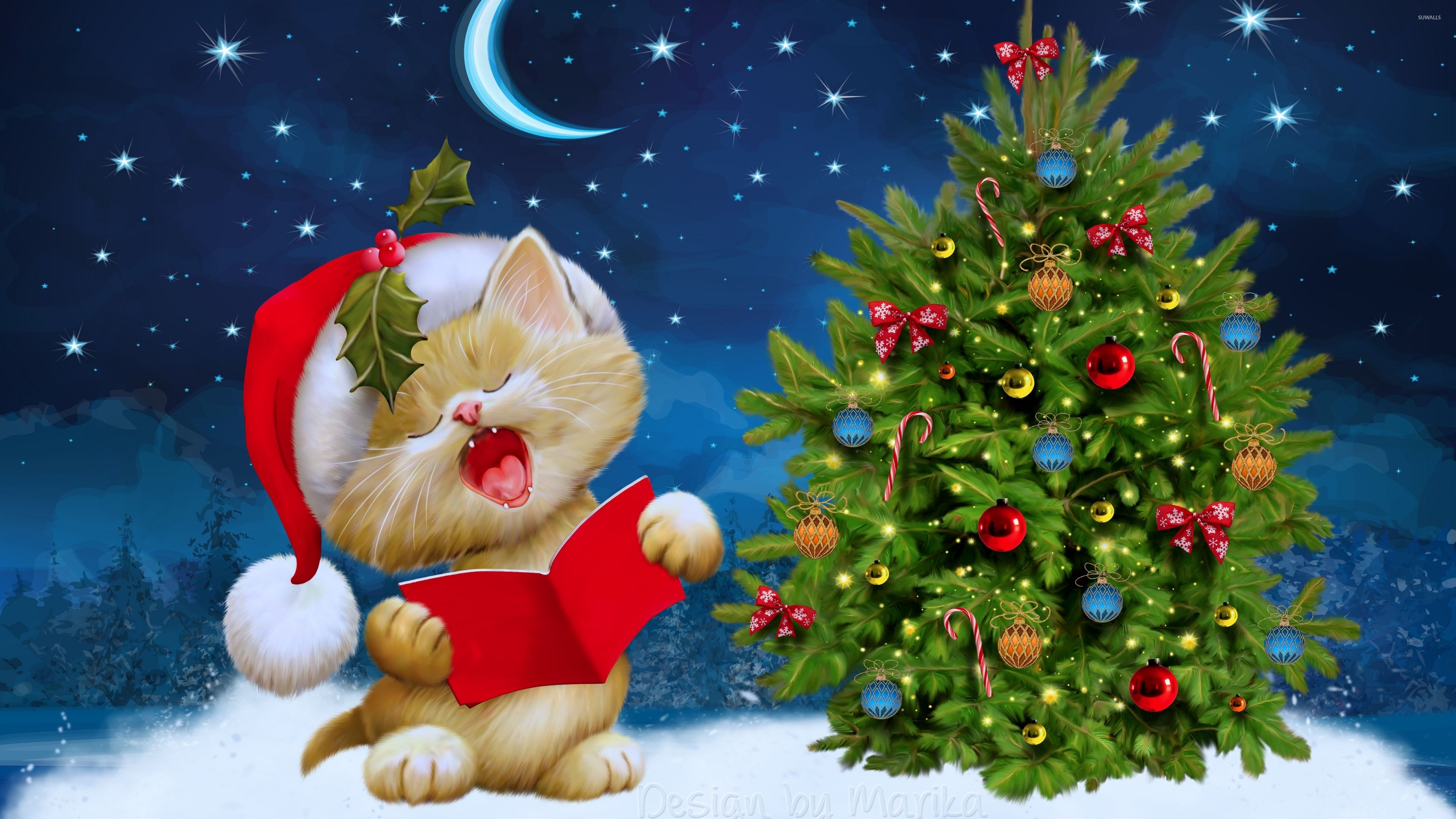 Kitten singing carols by the Christmas tree wallpaper wallpaper