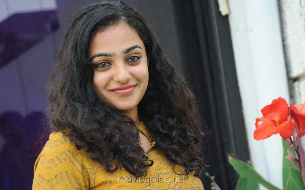 Nithya Menon Actress photo in kotigobba 2 Kannada film Indian Cinema