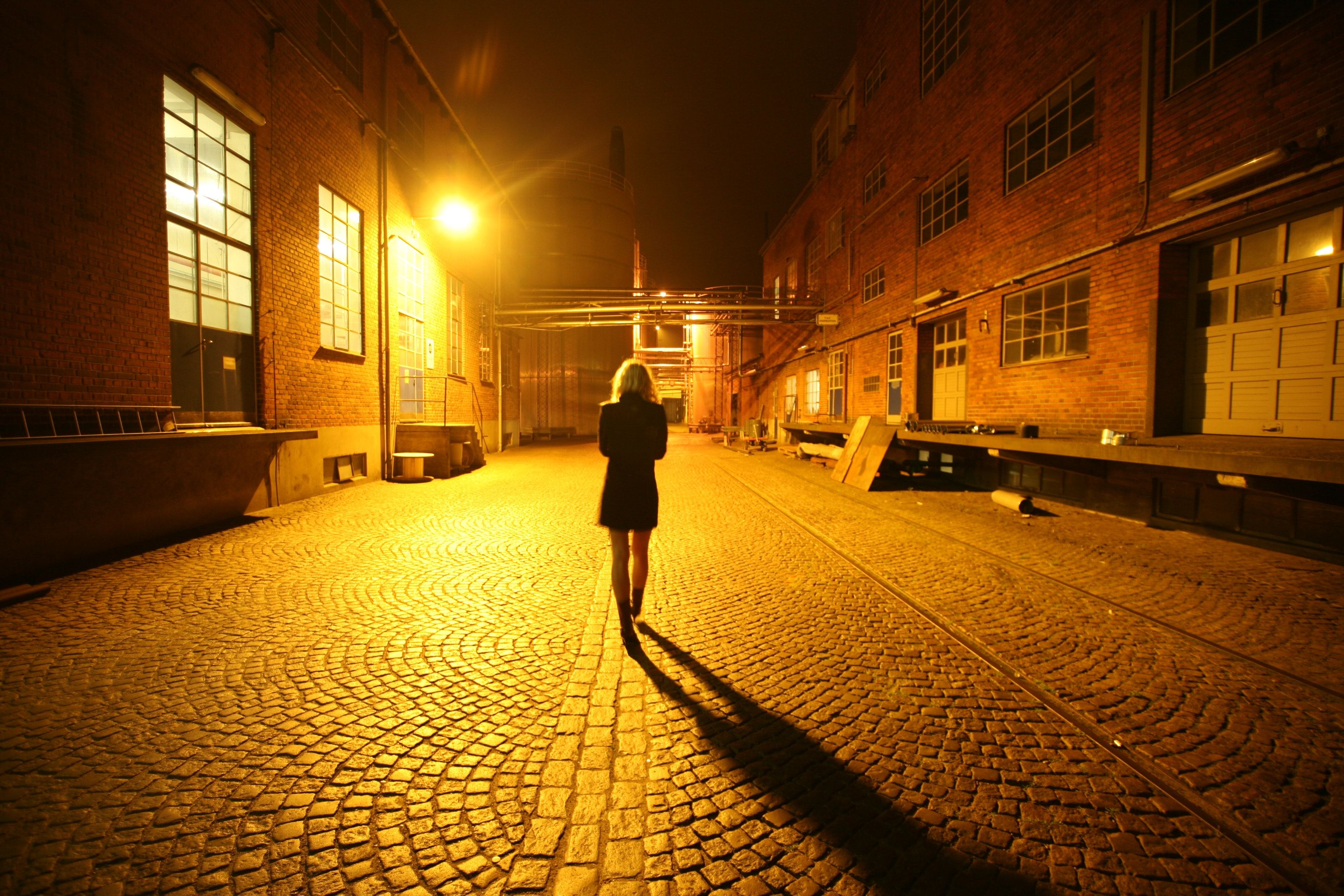 Woman Walking on Street at Night · Free