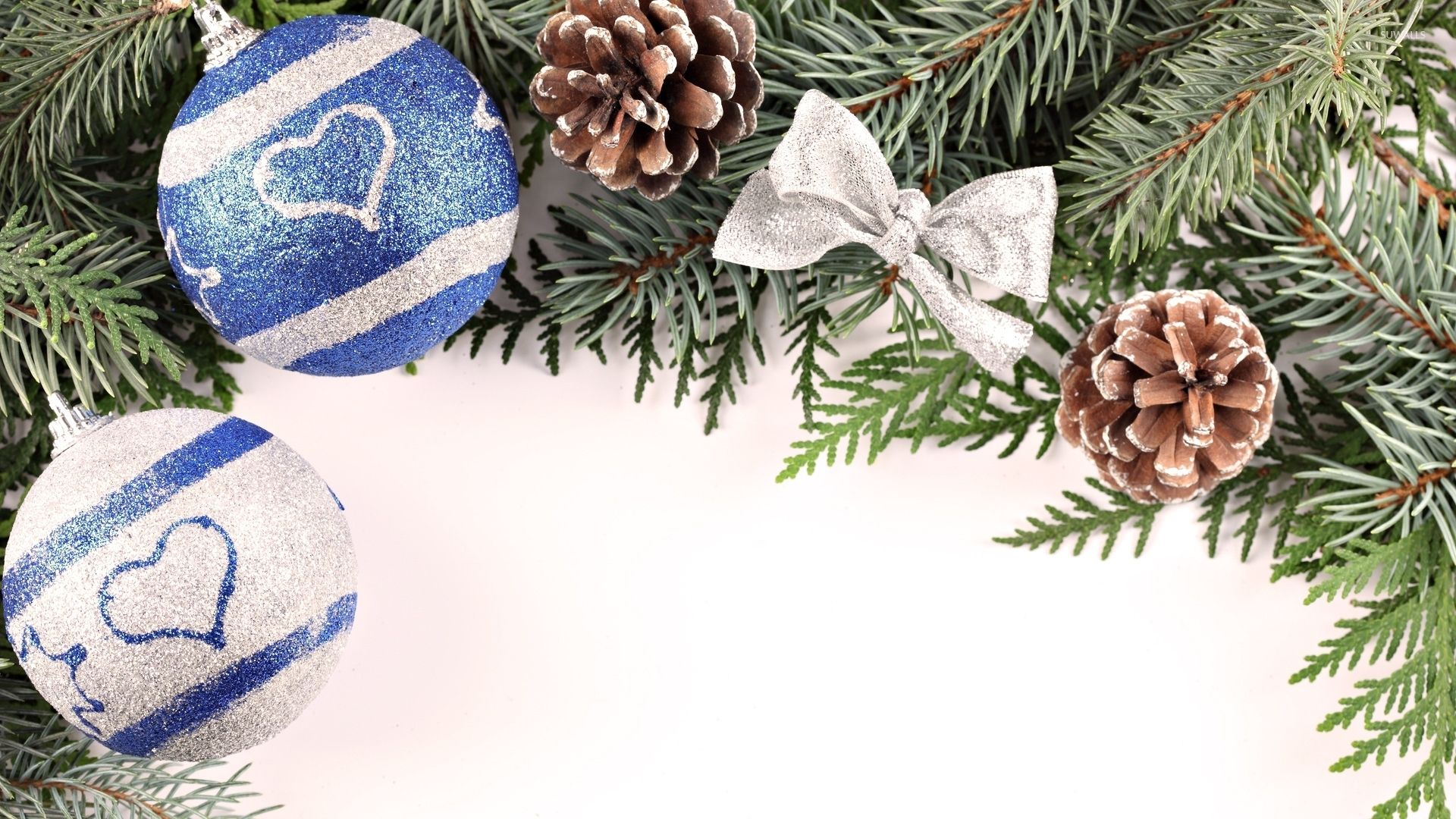 White and blue baubles in the Christmas tree wallpapers