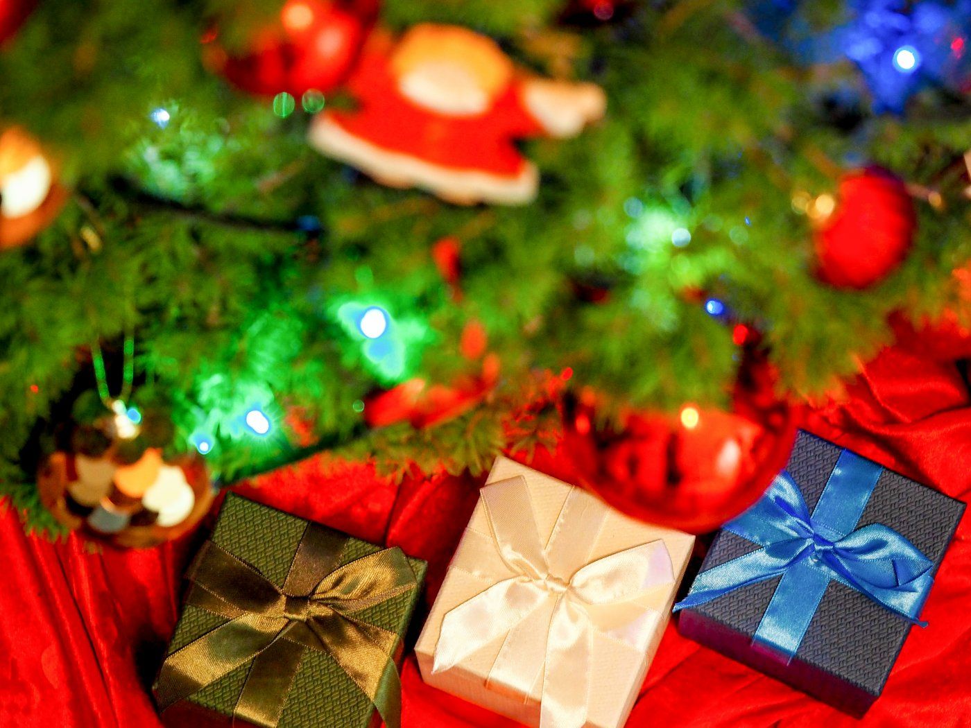 Three Christmas presents under the tree