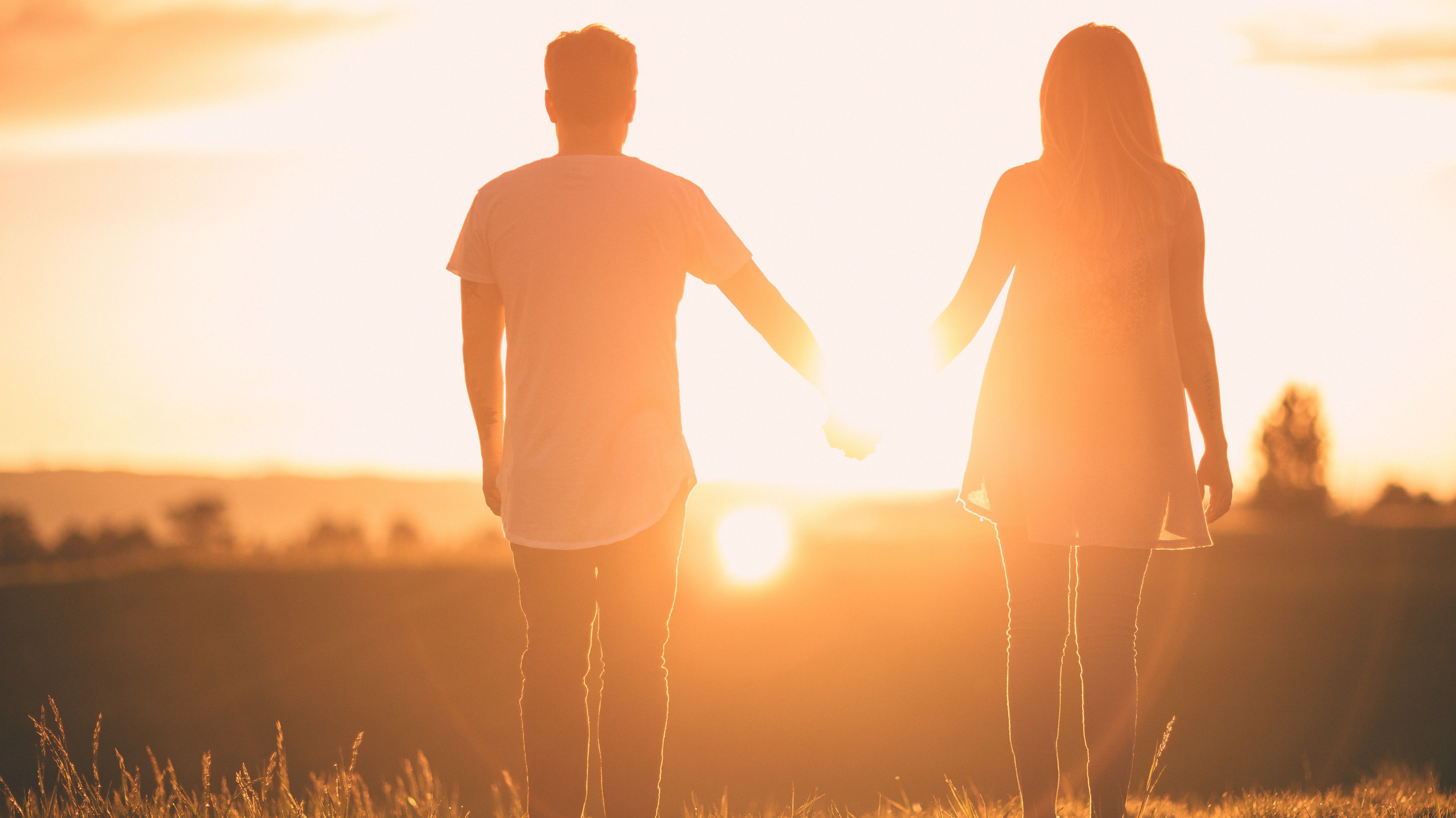 Boyfriend and Girlfriend Holding Hands 5K Romantic Wallpaper