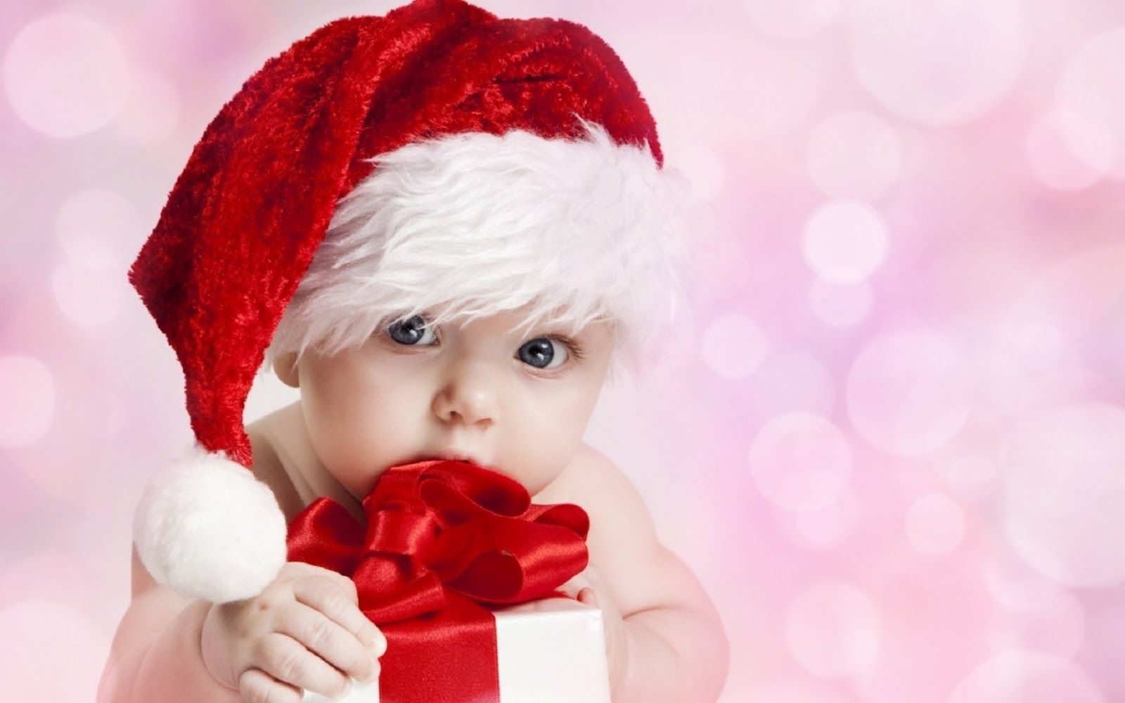 Beautiful Baby in Christmas outfit Image for wishing Merry Christmas