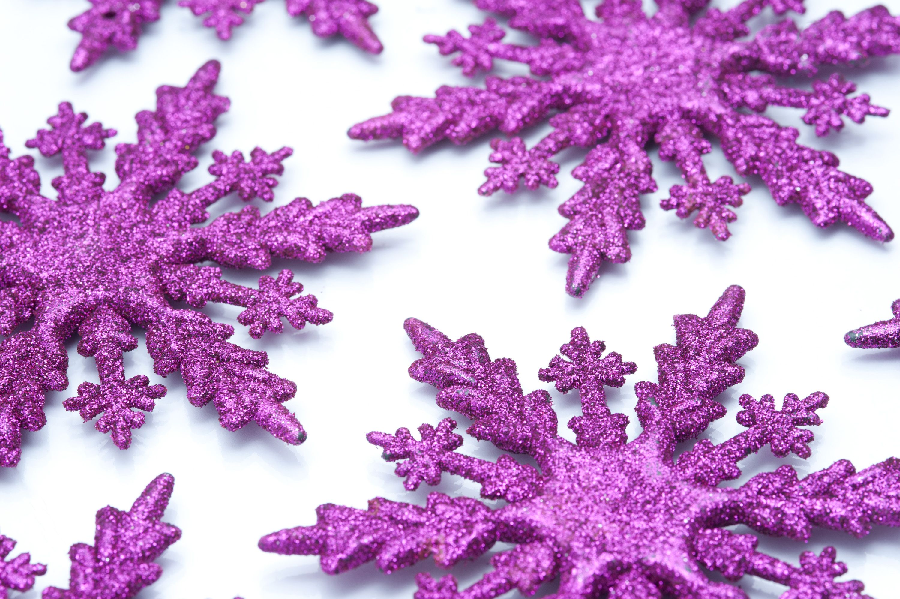 Photo of Pink snowflake ornaments. Free christmas image