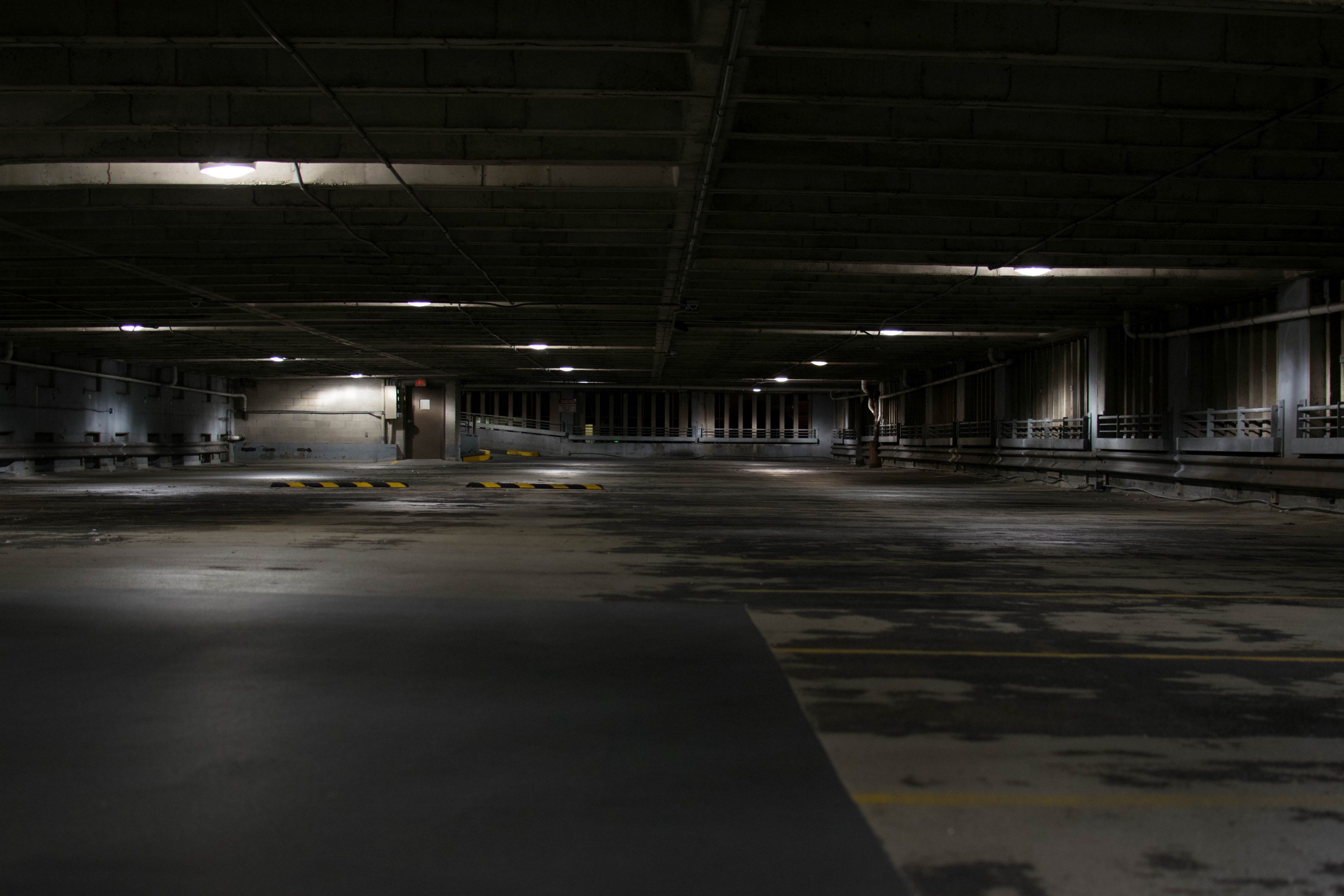 Wallpaper / a dark empty concrete parking space in milwaukee, dark empty parking space 4k wallpaper