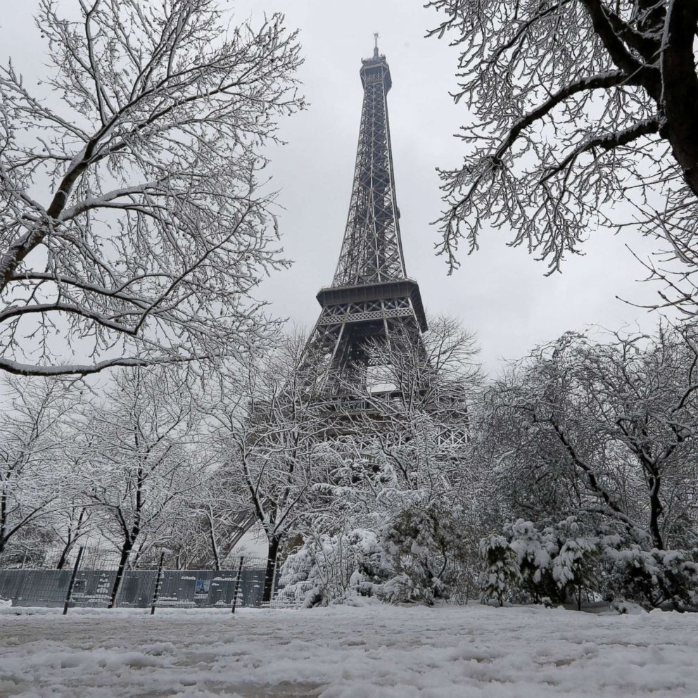 Heavy snow shuts down Eiffel Tower weeks after abnormal rainfall soaked Paris