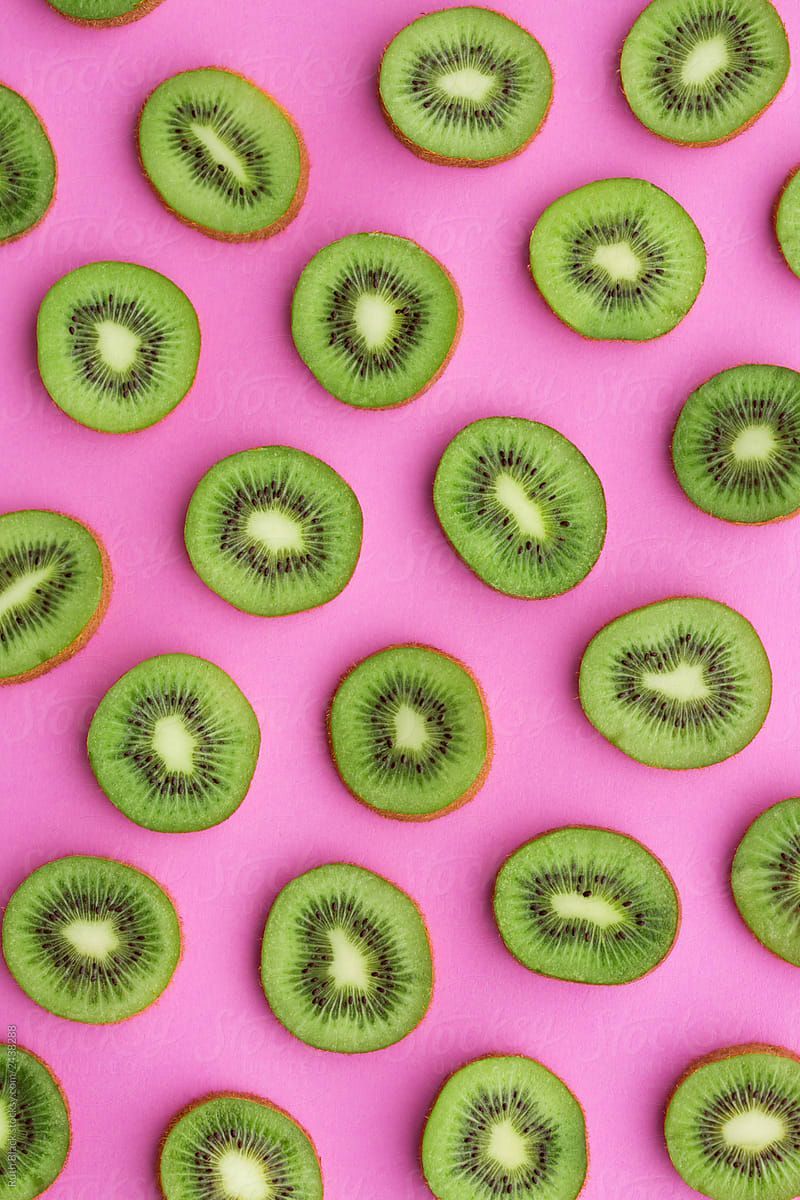 Kiwi fruit background by Ruth Black for Stocksy United. Fruit wallpaper, Pretty wallpaper iphone, Fruit photography