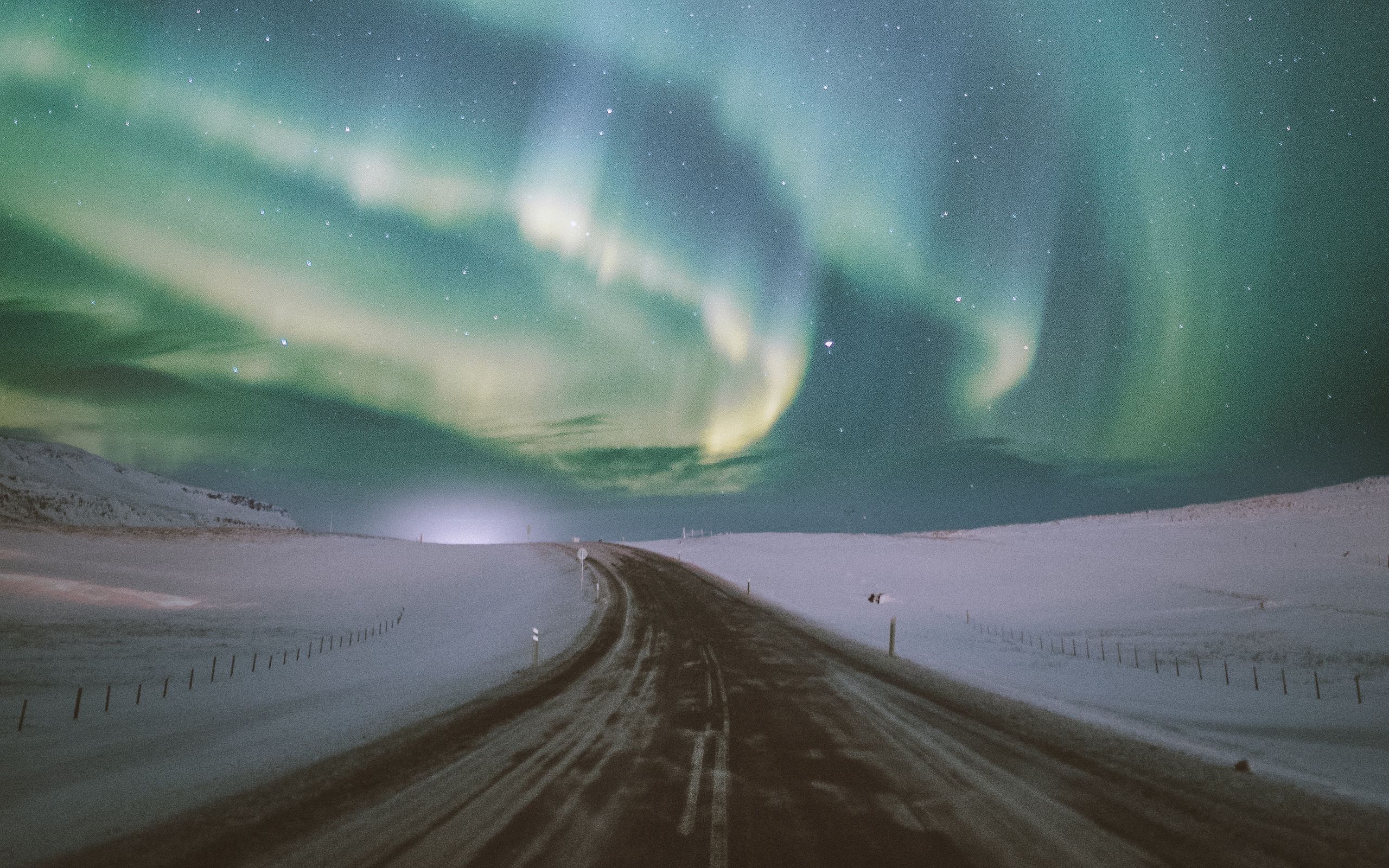 Download wallpaper 2560x1600 northern lights, aurora, road, snow, starry sky widescreen 16:10 HD background