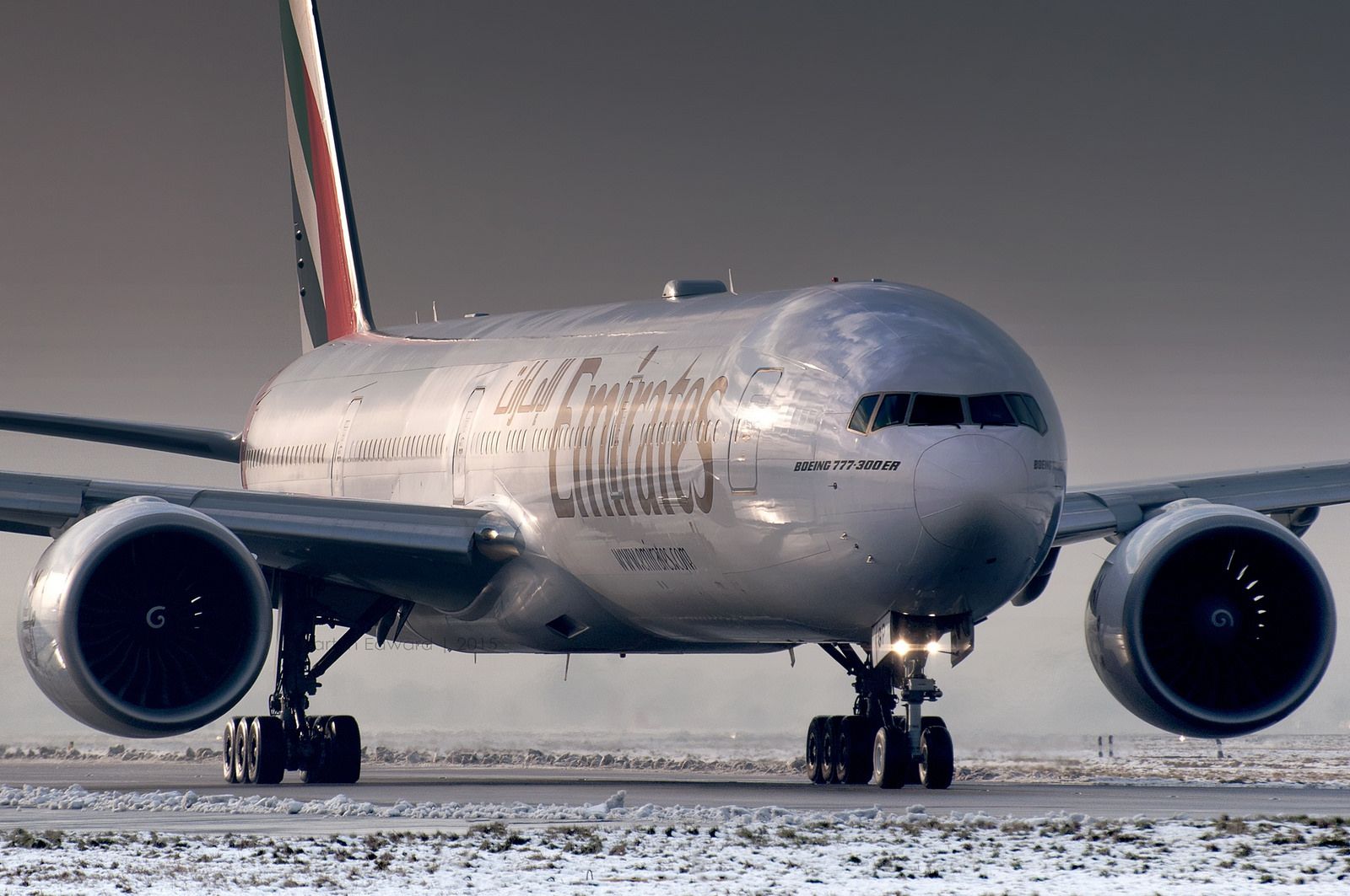 300ER Planes Boeing Emirates Airplane Depth Of Field Winter Snow Boeing 777 Wallpaper:1600x1063