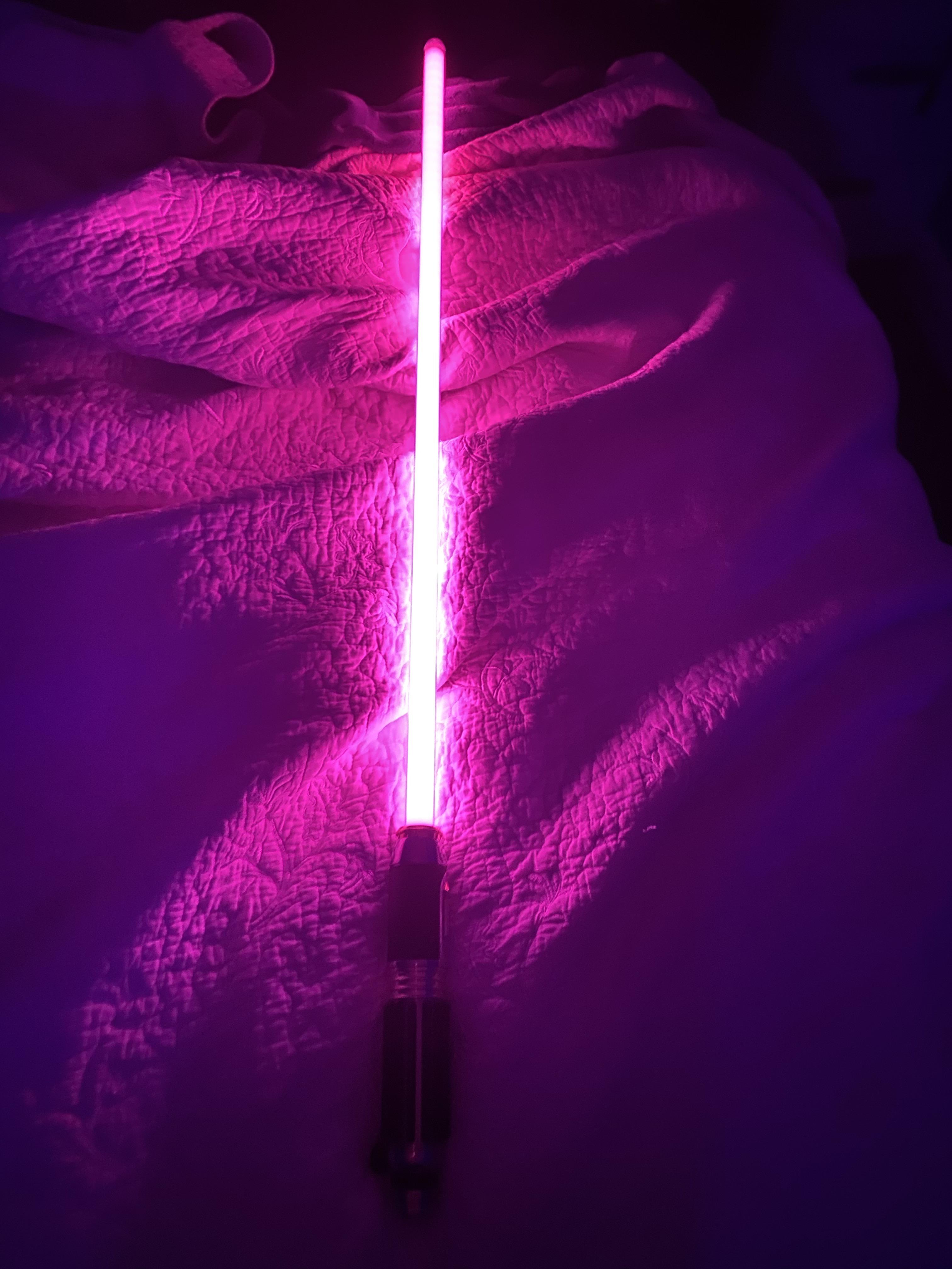 Is my Mace Windu Lightsaber supposed to be pink? It was pink when I first bought it so I'm wondering if it's the same for everyone else