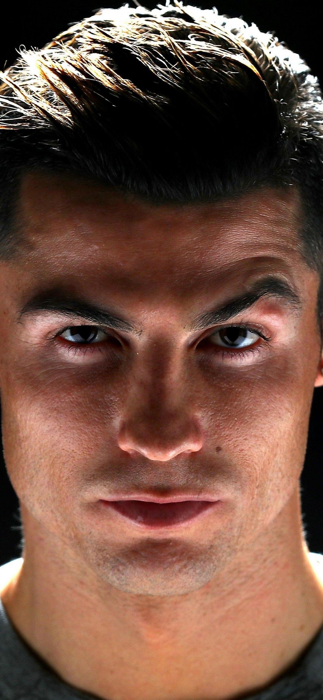 Download 1125x2436 Cristiano Ronaldo, Face Portrait, Earrings Wallpaper for iPhone 11 Pro & X