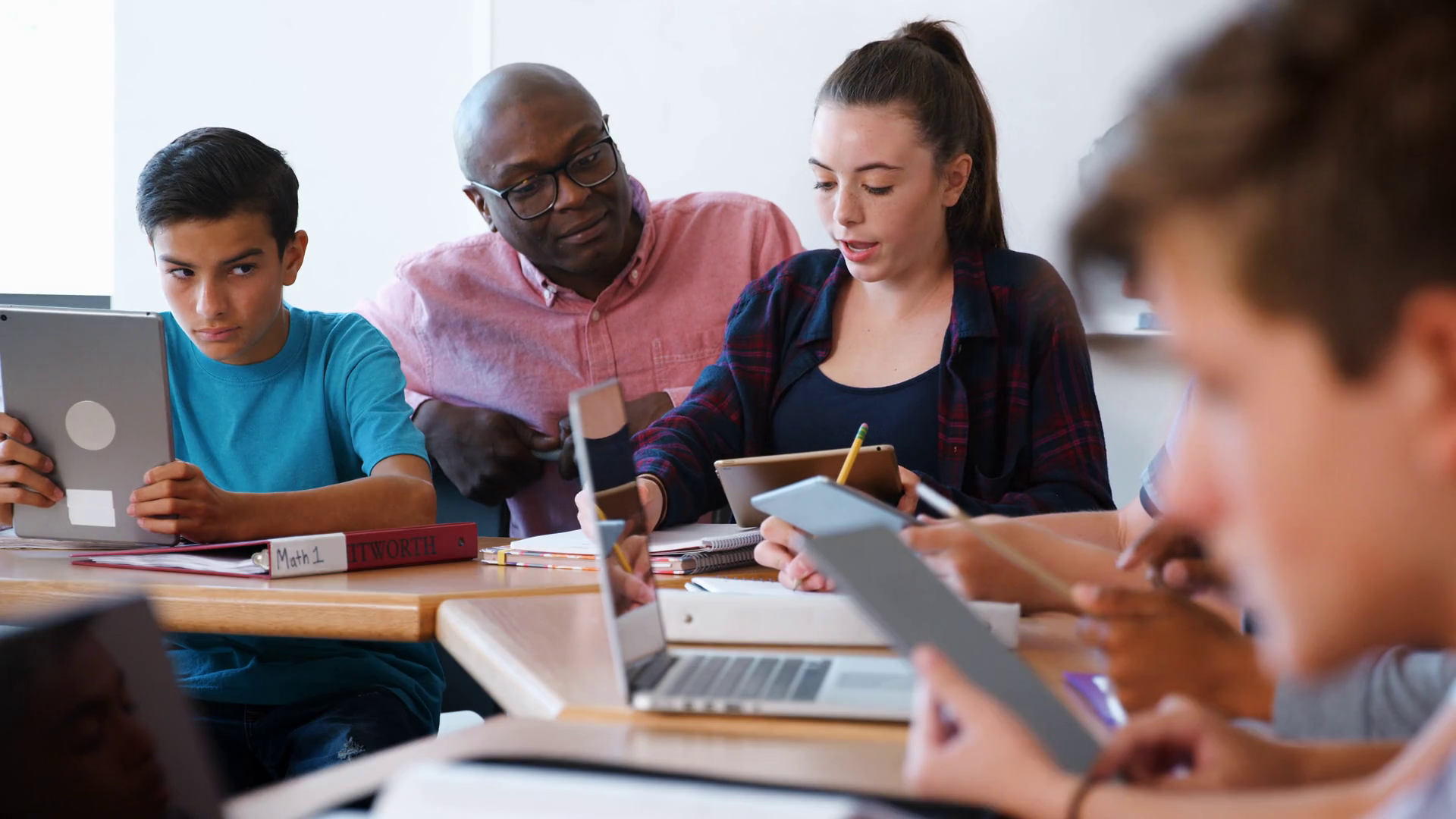 Female High School Student Receiving Individual Attention From Teacher In Class Stock Video Footage