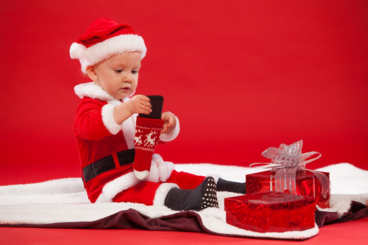 Desktop Wallpaper newborn Christmas Children Winter hat Santa Claus