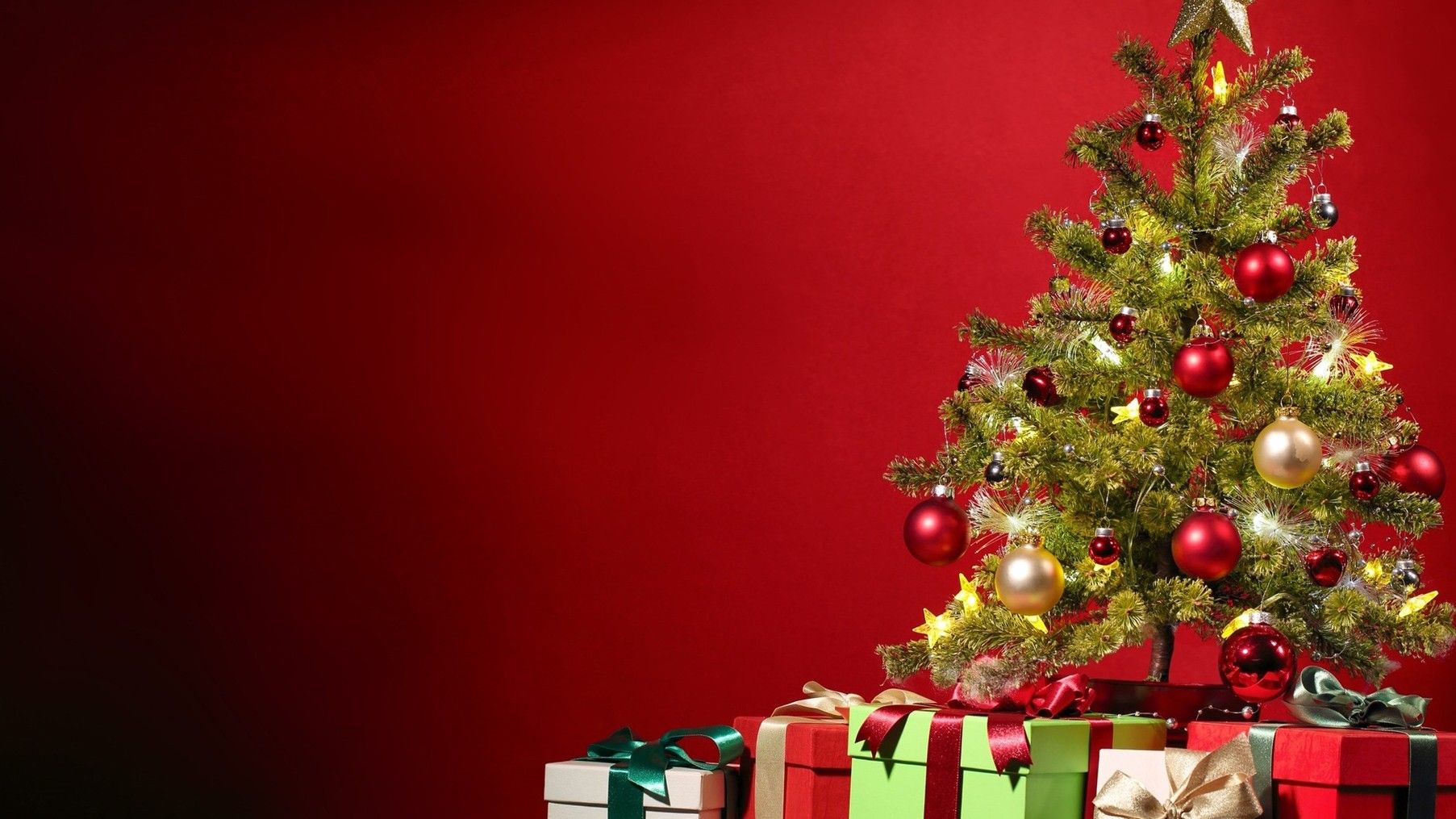Christmas Tree With Gifts On The Red Background