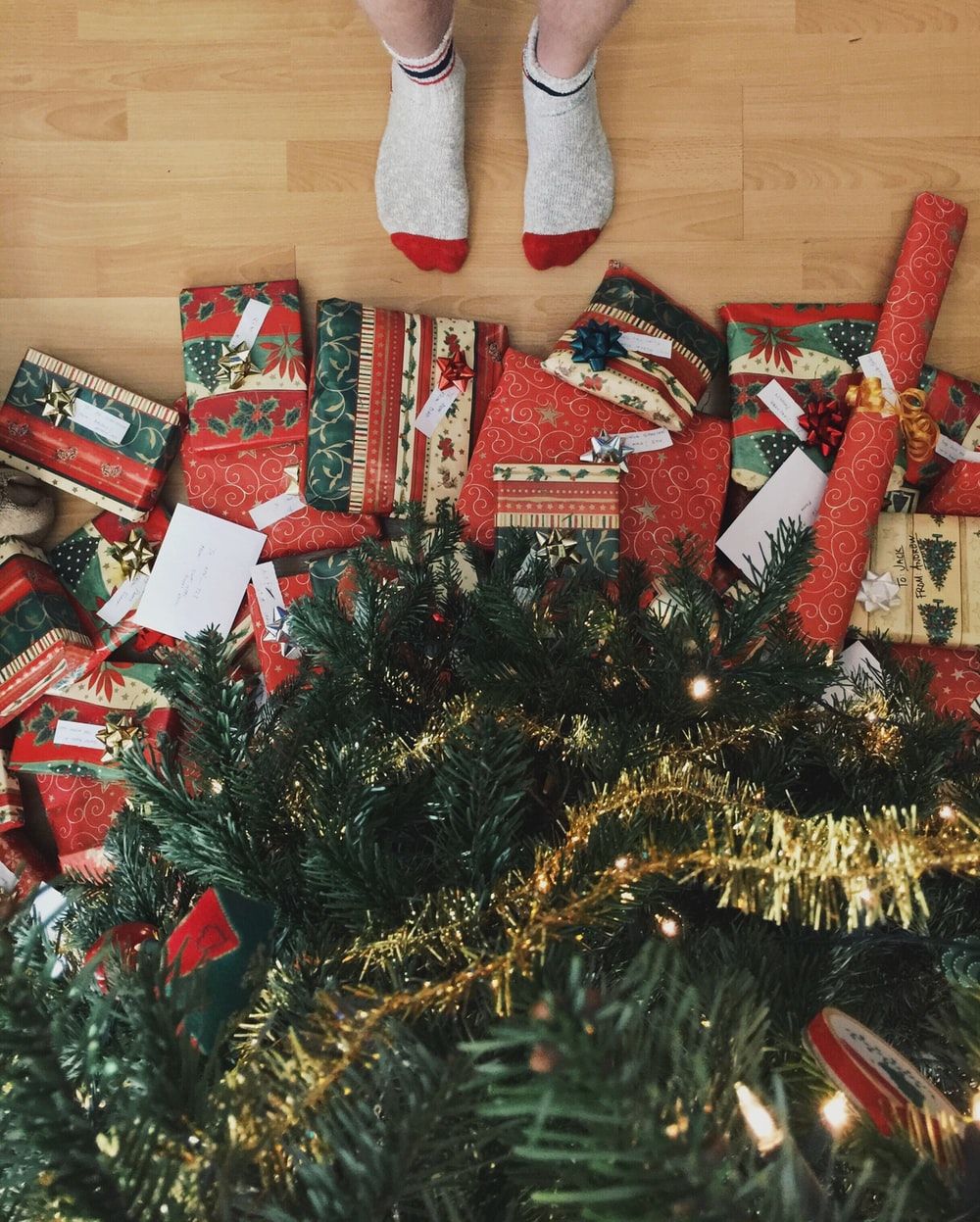 four gift boxes under Christmas tree photo