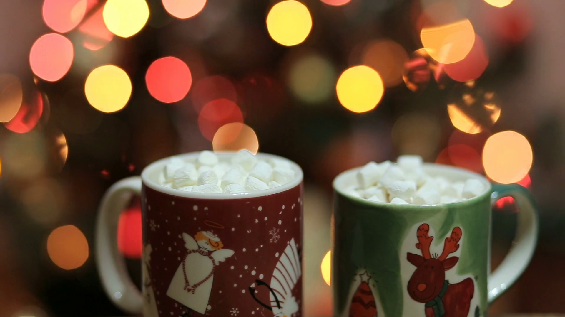 Cups of hot cocoa with marshmallow with Christmas decorations at home, Christmas tree on background, cozy mood Stock Video Footage