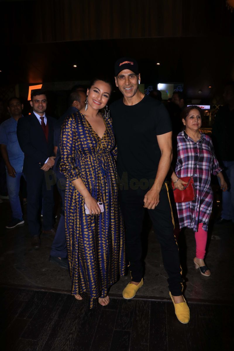 Akshay Kumar poses with Sonakshi Sinha at the screening of her film Khandaani Shafakhana; Ayushmann Khurrana and Tahira Kashyap join