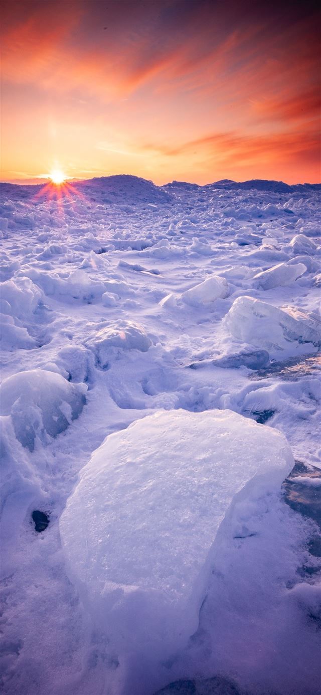 snow during golden hour iPhone 12 Wallpaper Free Download