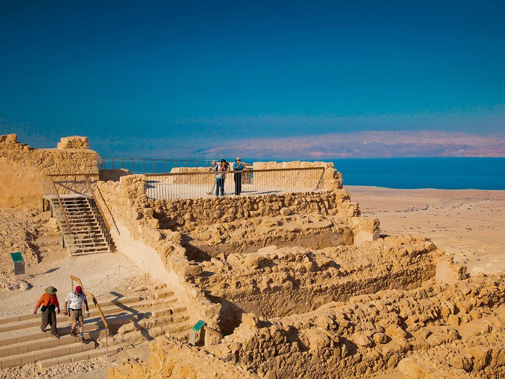 Aerial View Of The Ruins Of Massada Is A Fortress Built By Herod The Great  On A Clifftop Off The Coast Of The Dead Sea Destroyed By The Romans In The  1st